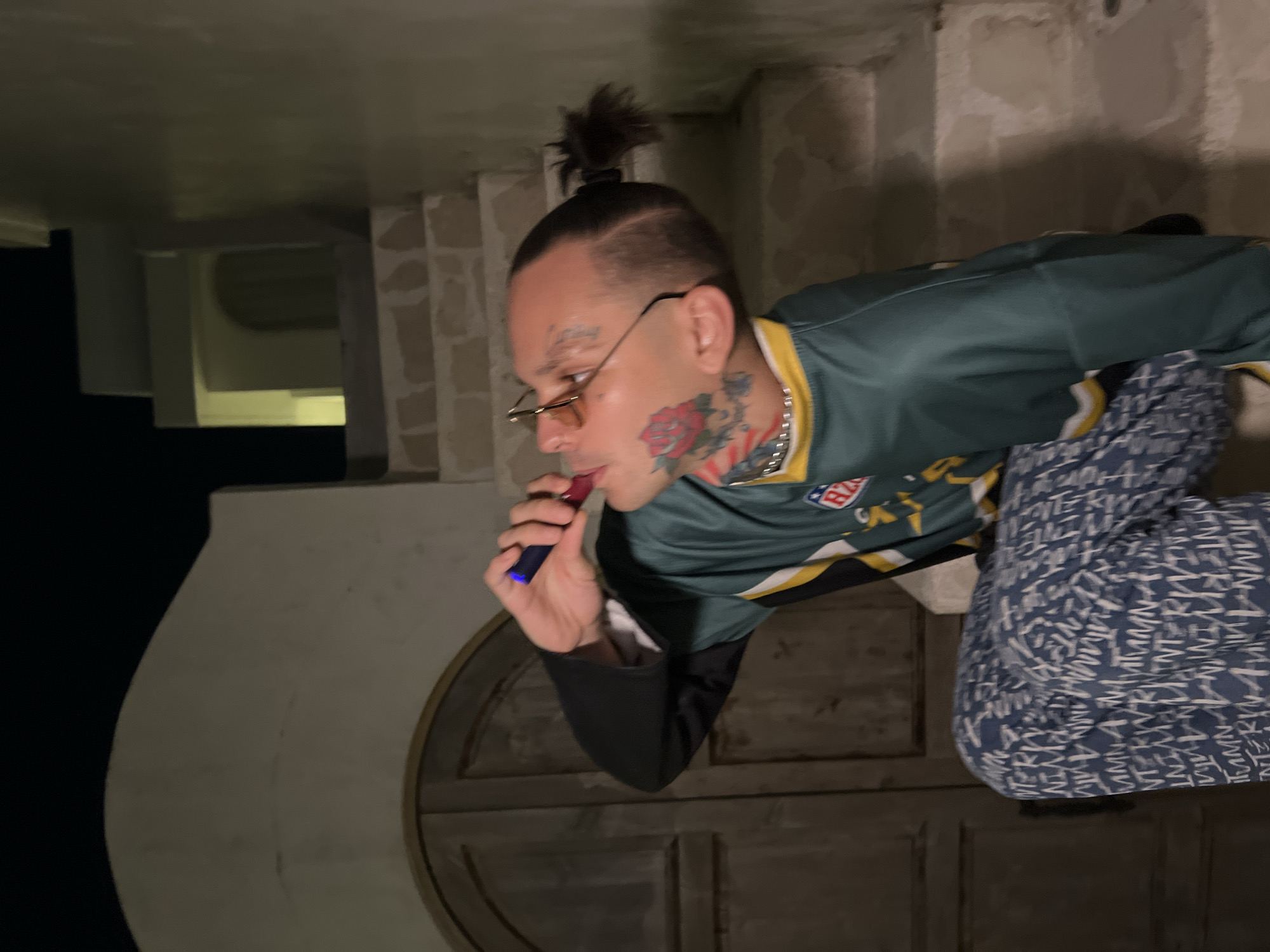 Late-night freestyle session: breakdancing and poolside antics in a green jersey