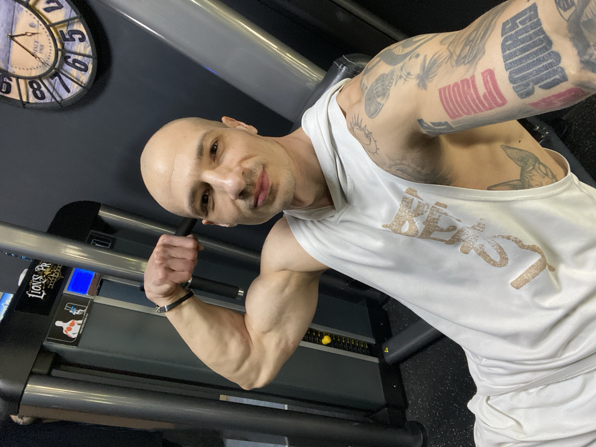 Tattooed man photographed at fitness center in Pleven
