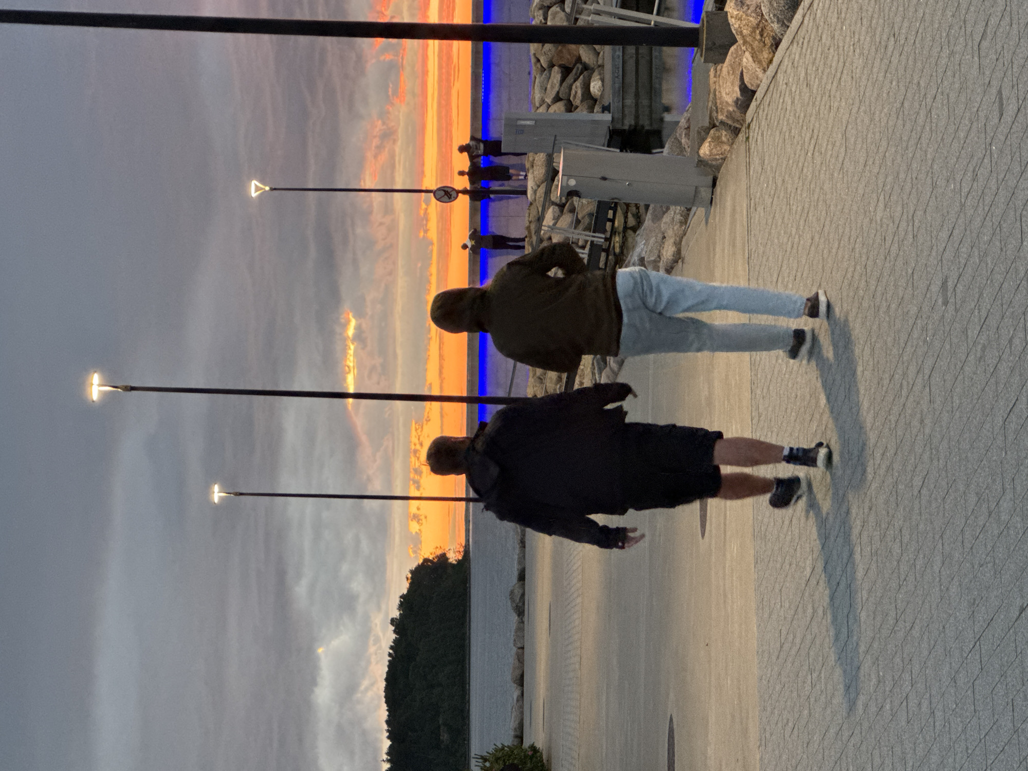 Tallinn waterfront promenade at a striking midsummer sunset