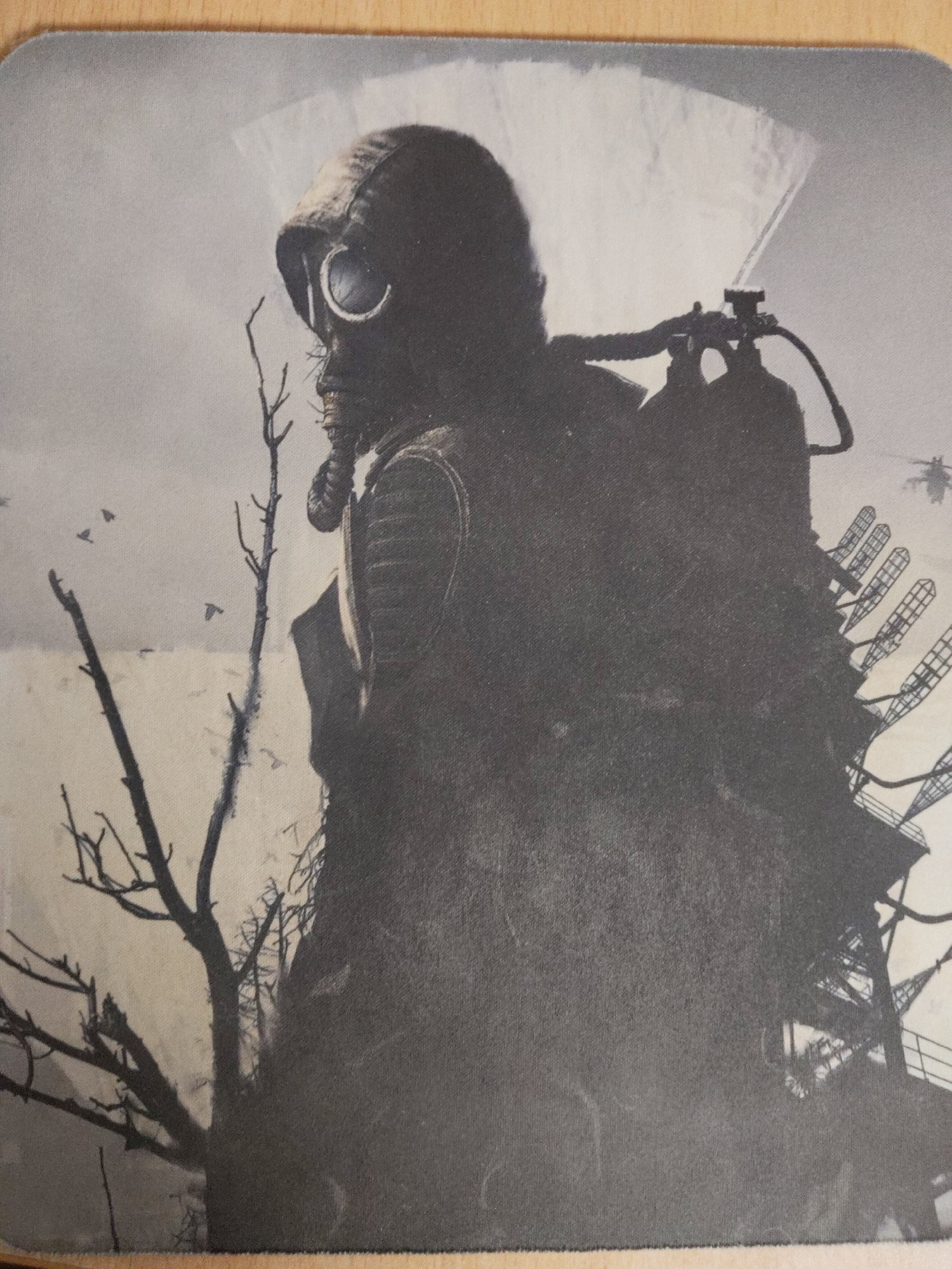 Figure in gas mask, protective gear photographed in Perm