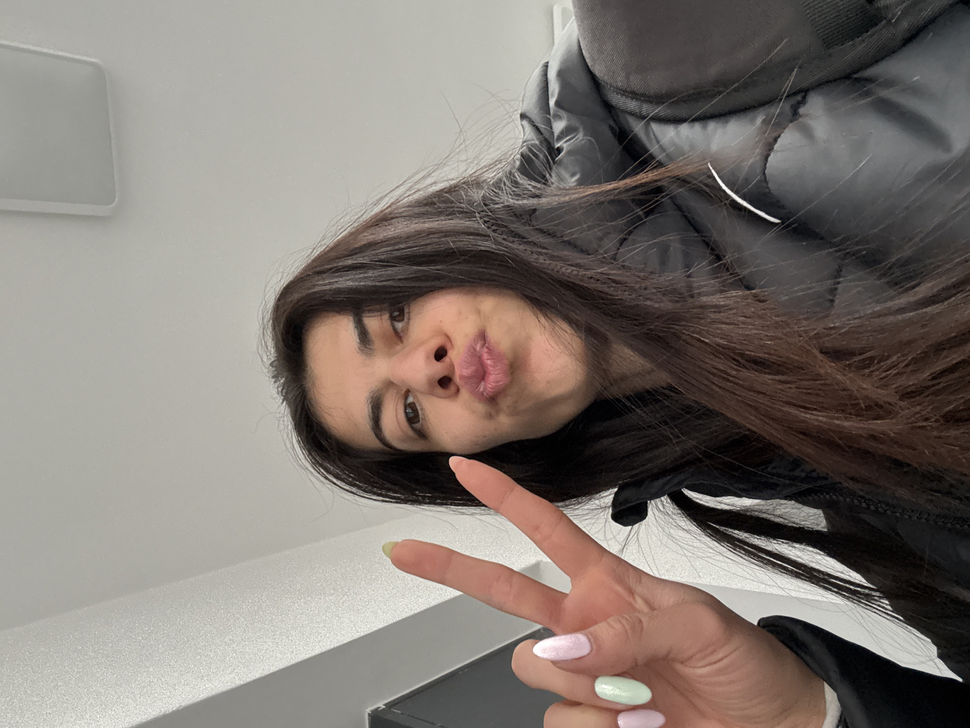Woman takes elevator selfies in Sofia