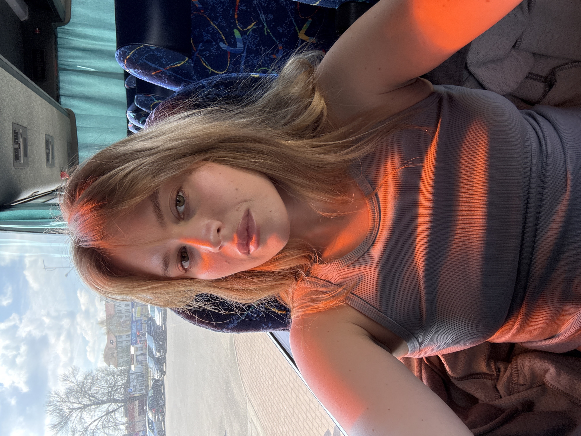 Woman takes selfie on morning bus ride in Lida