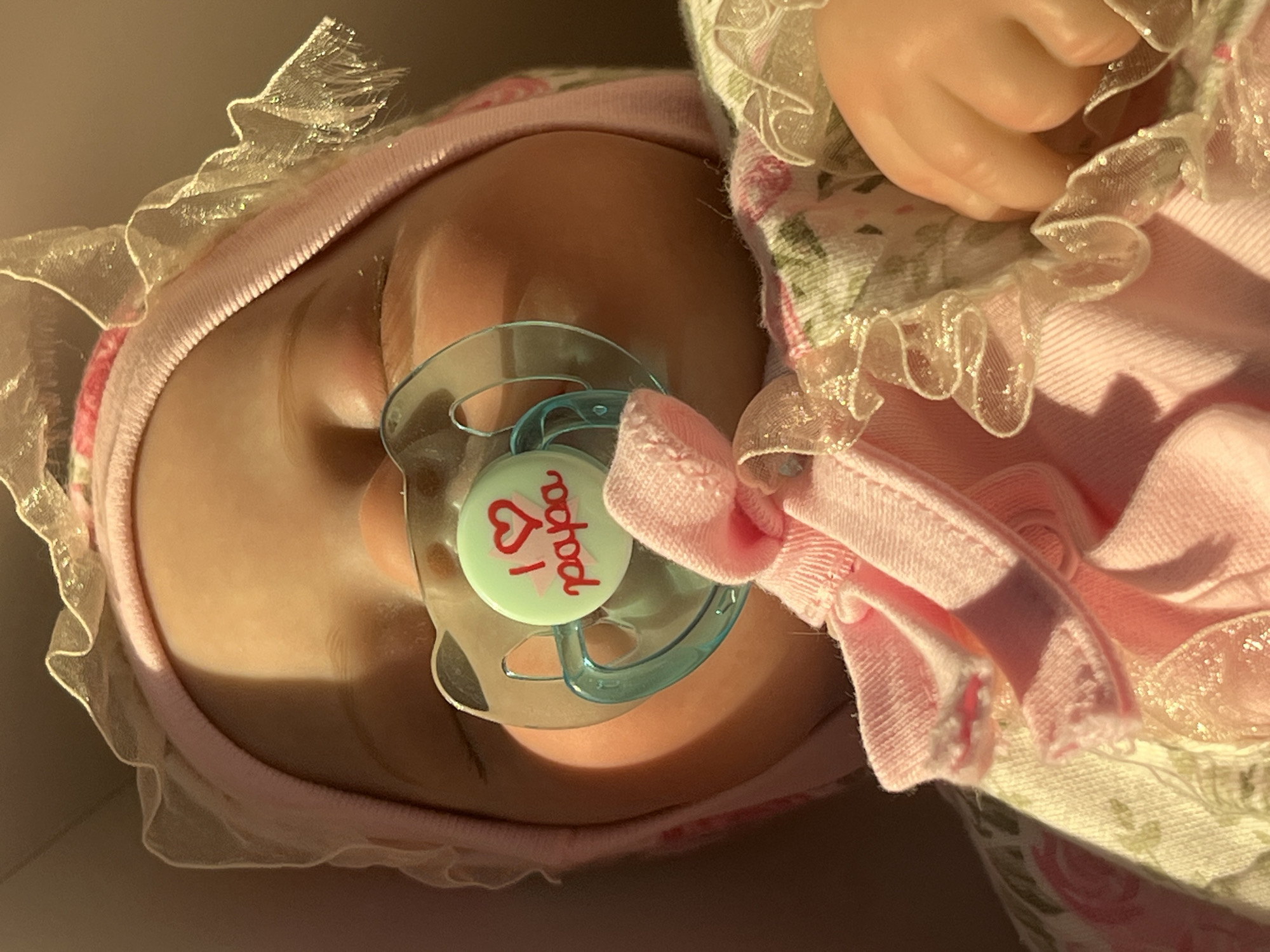 Sphynx cat and baby dolls photographed indoors in Votkinsk