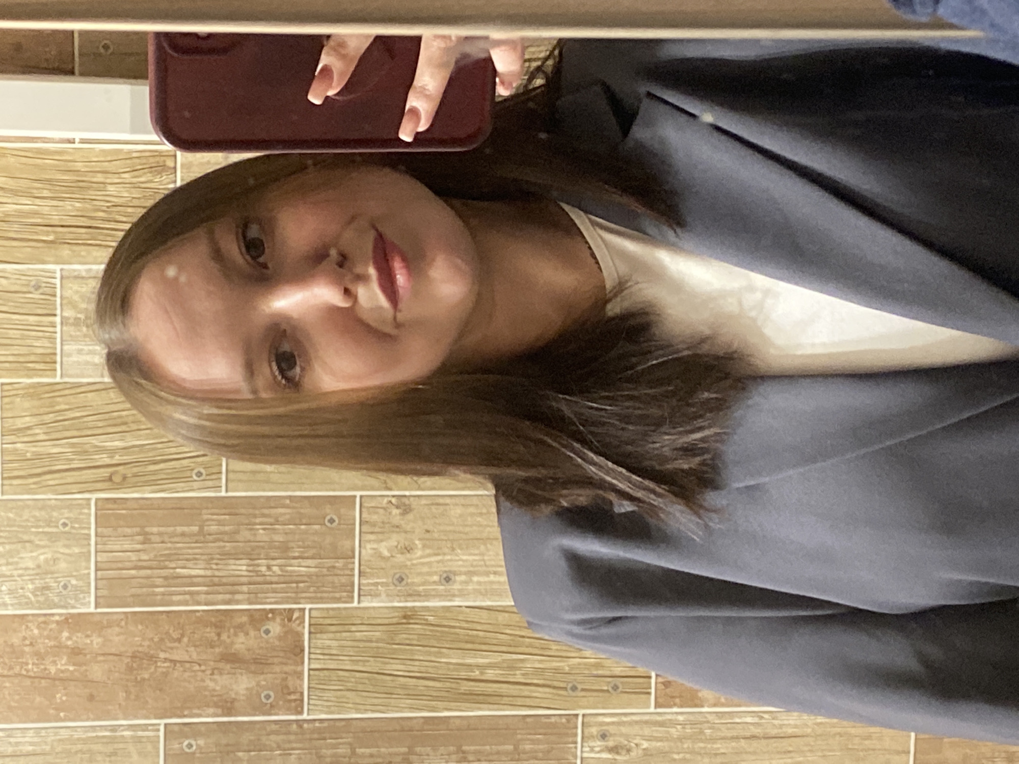Woman documents afternoon outing through selfies in Chaikovsky, Russia