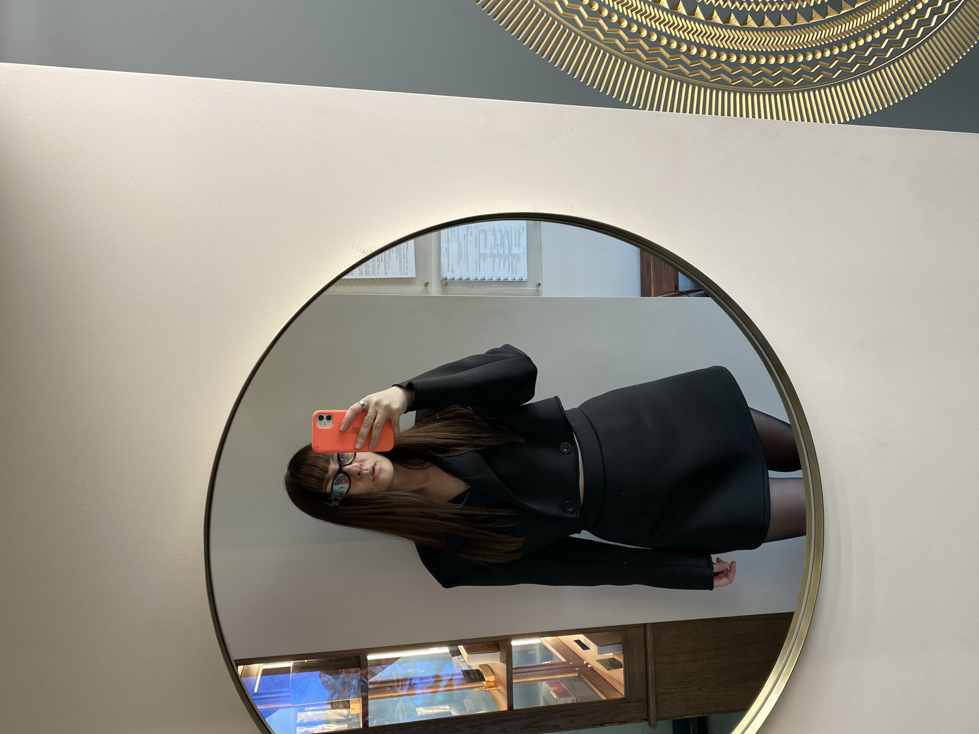 Woman takes mirror selfie in Votkinsk, Russia