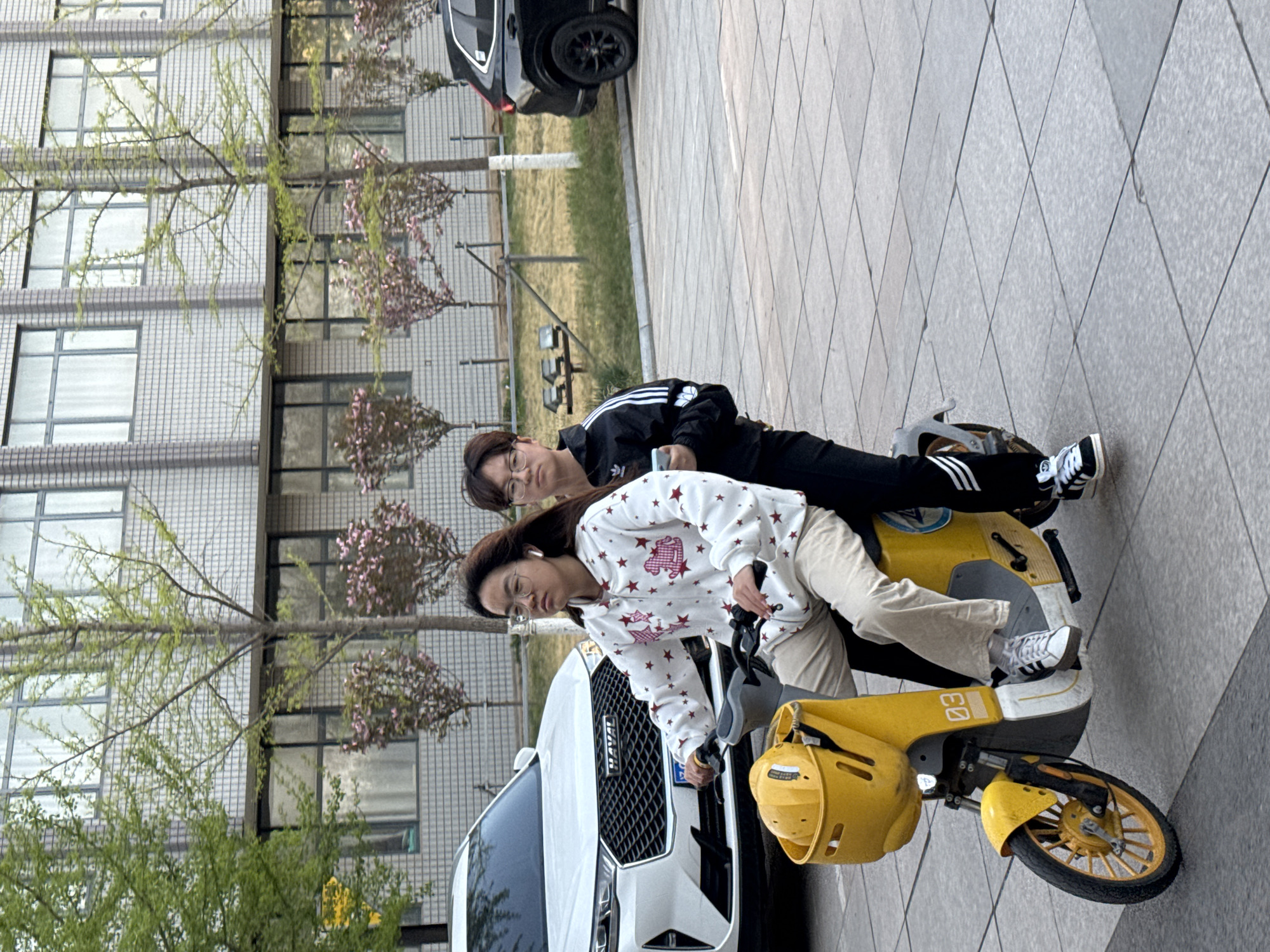 Young people gather with electric scooters in Zhongtun, China