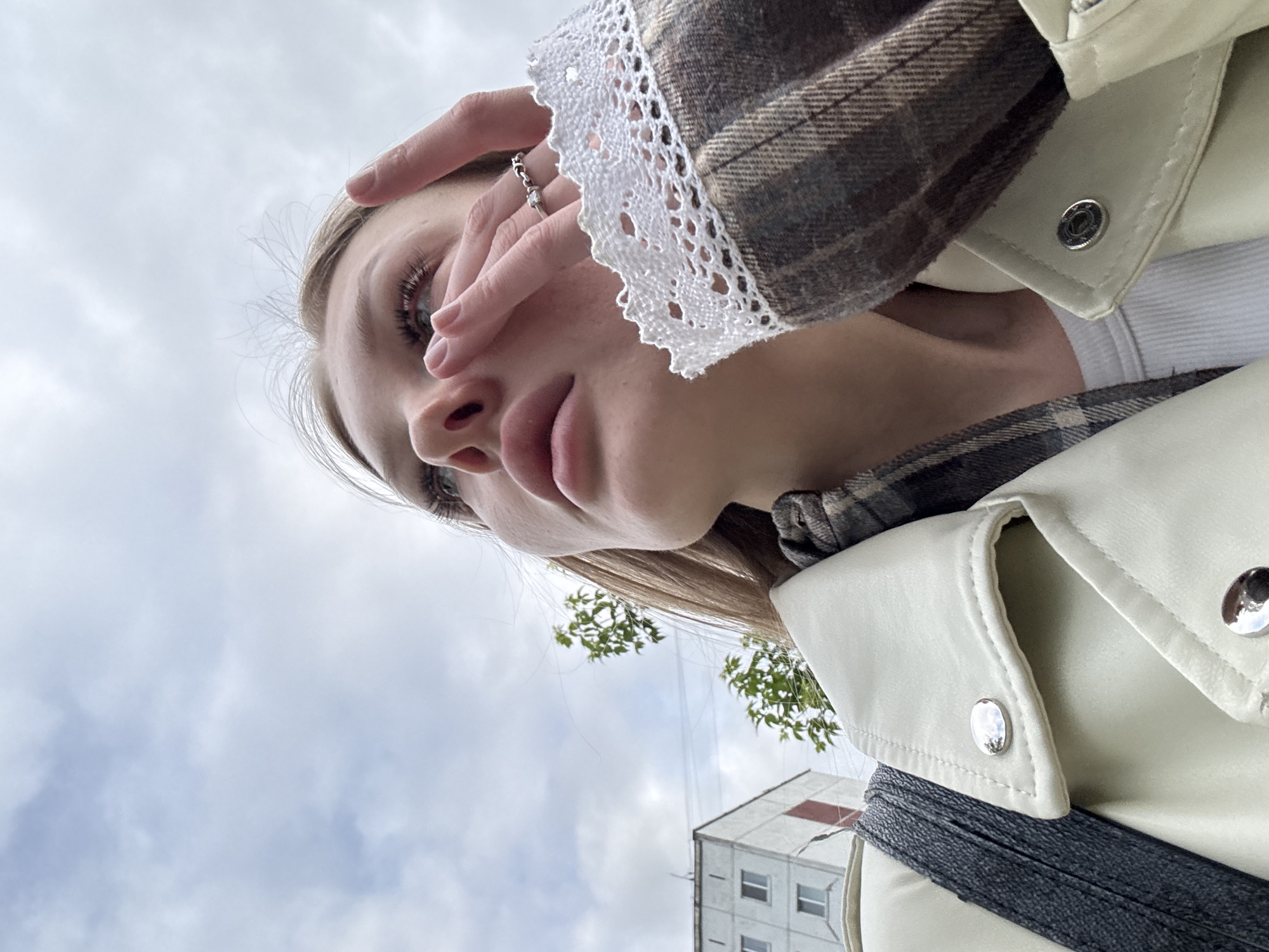 Young woman takes multiple selfies in Perm, Russia