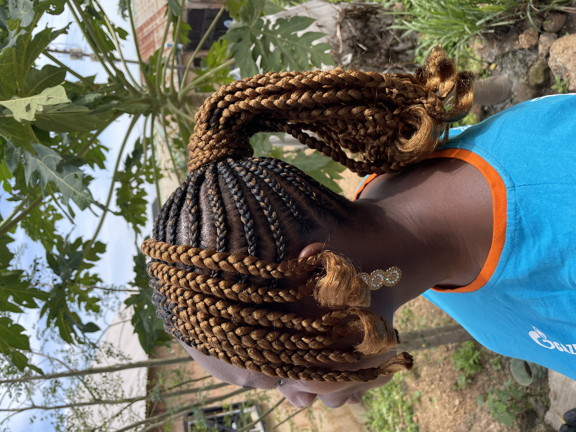 Close-up angles on braided ponytail style in Jos, Nigeria