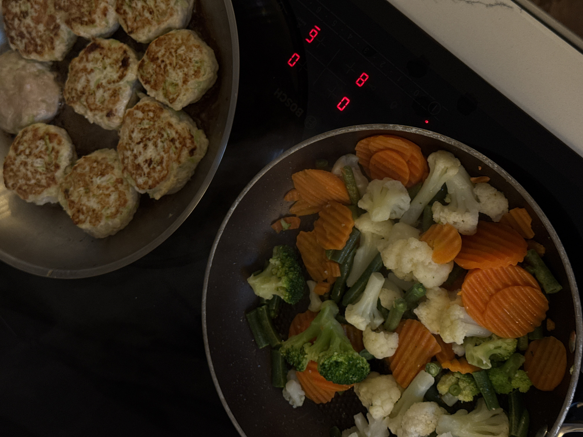 Home cooking scene captured on Moscow induction cooktop