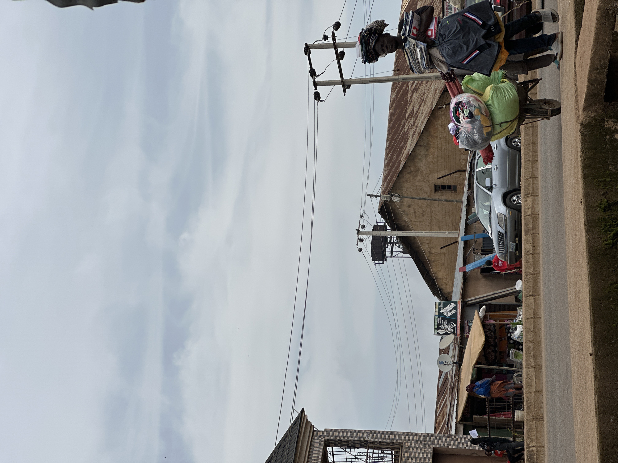 A busy morning on the streets near Victory Plaza, Bukuru