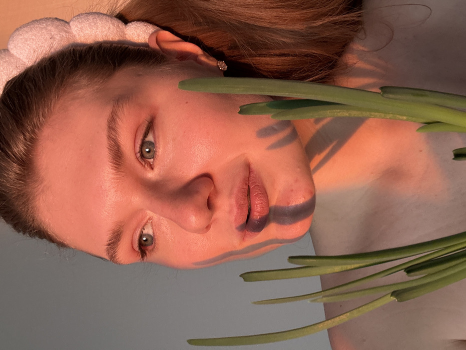 Woman documents afternoon routine with white headband in Kazan