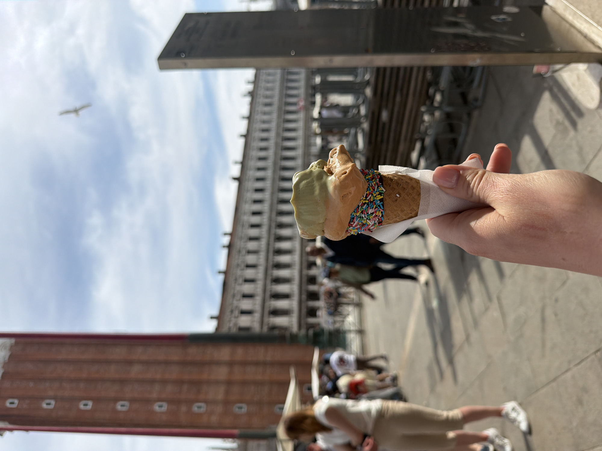 Tourist captures typical Venice afternoon: gondolas, gelato, shopping