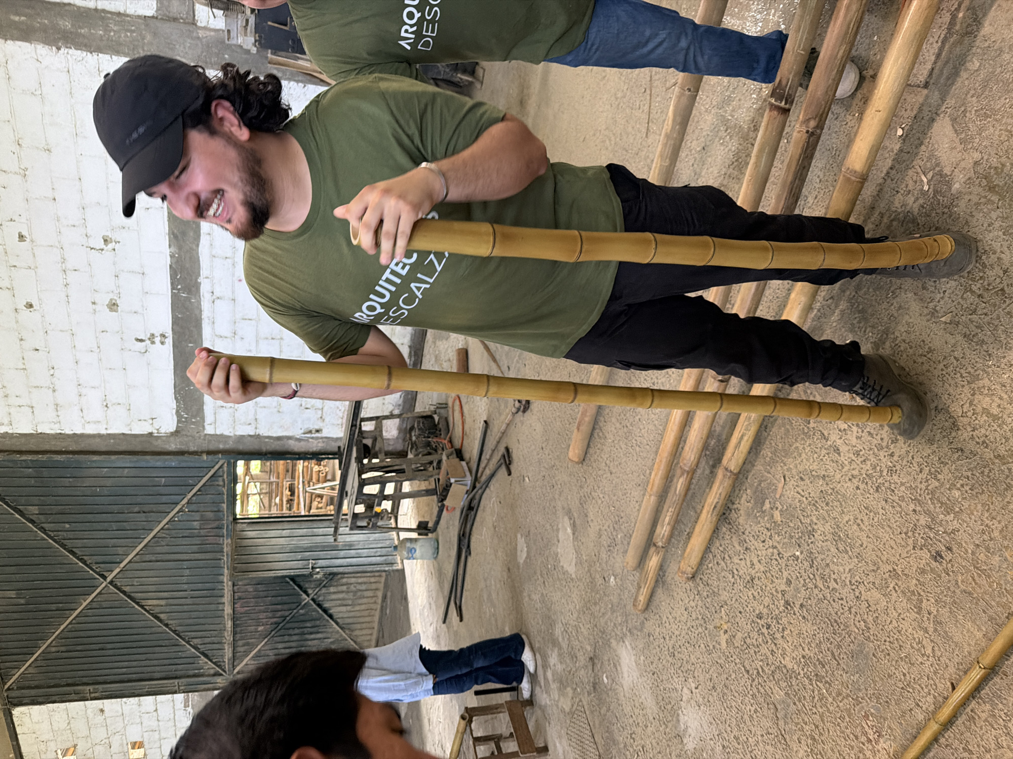 Man with bamboo items observed in Equimita workshop