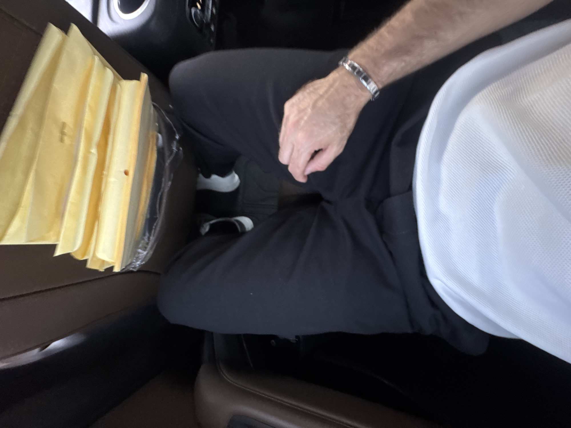 Vehicle interior documented in Mexico City showing passenger, objects