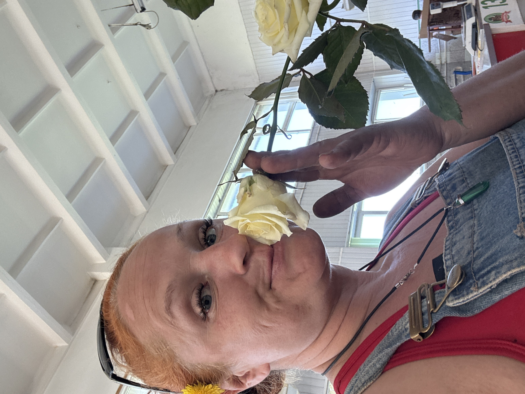 Woman poses with roses during early morning photoshoot in Chaikovsky