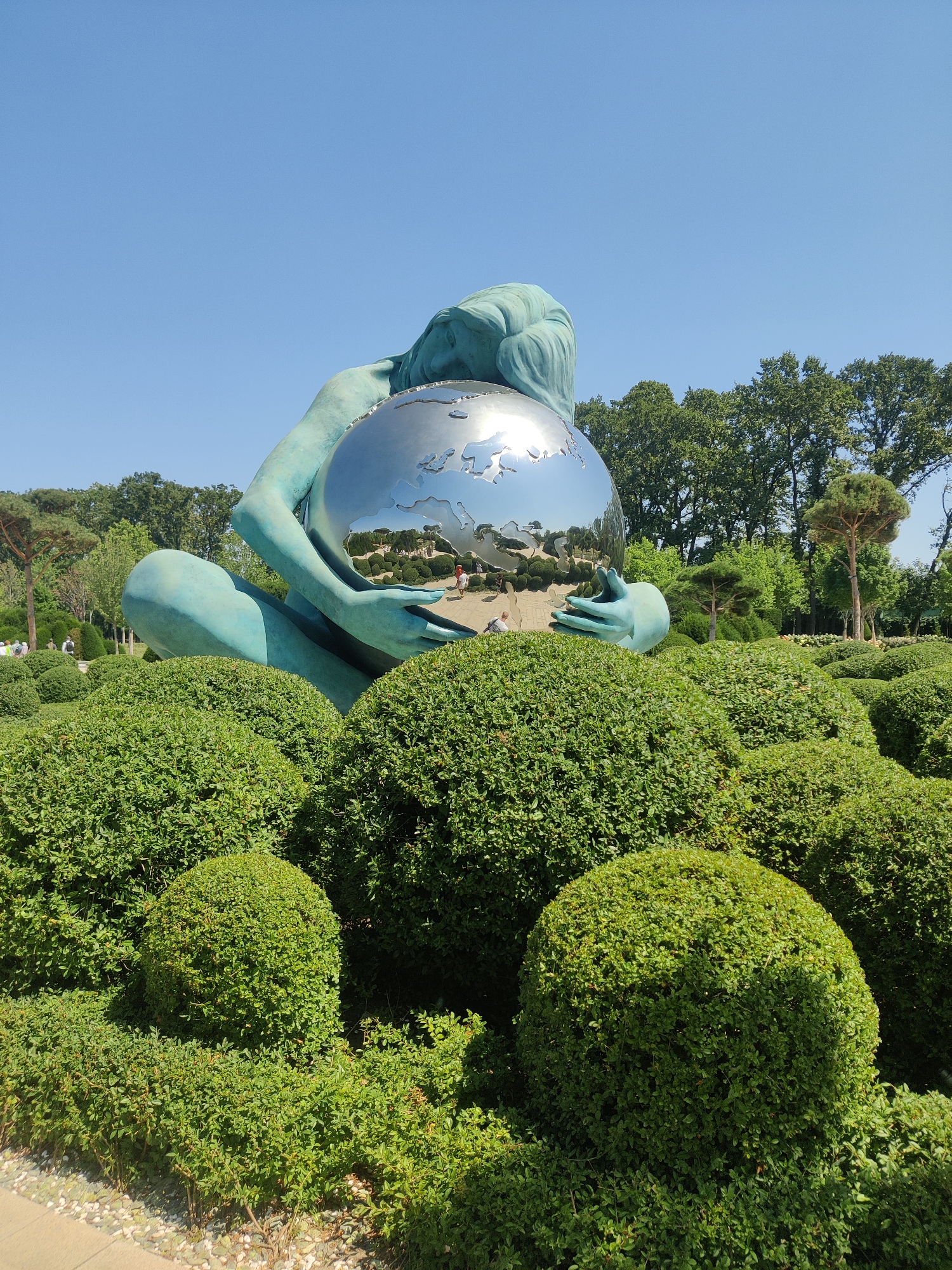 Formal garden park in bloom, torii gates and hydrangeas
