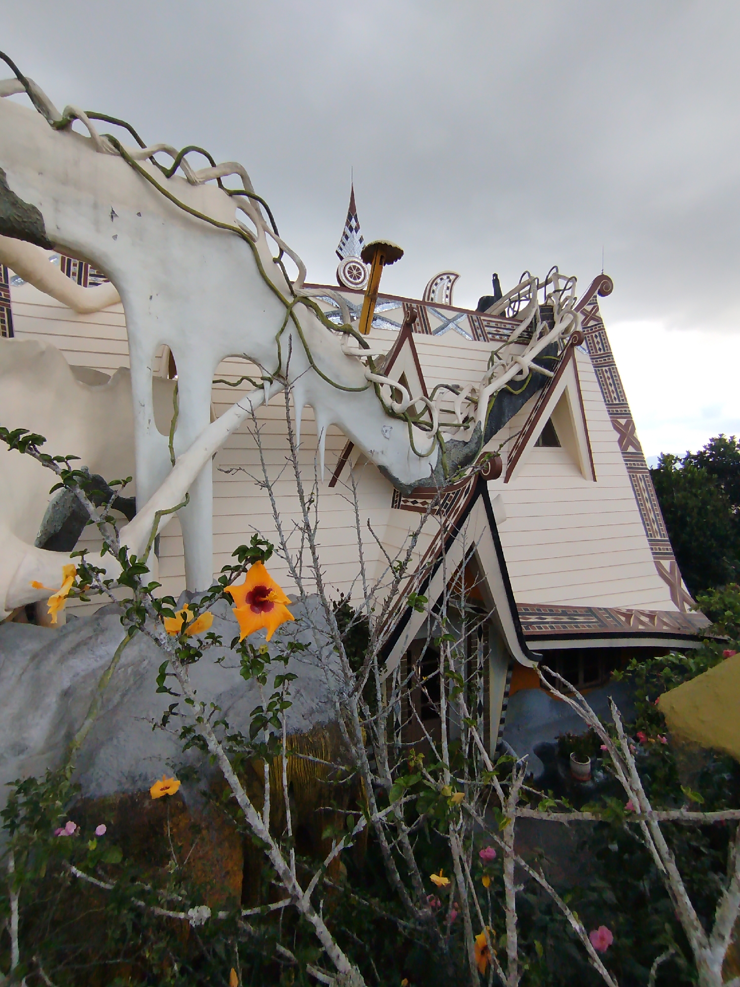 Tourist visits iconic Crazy House architecture in Da Lat
