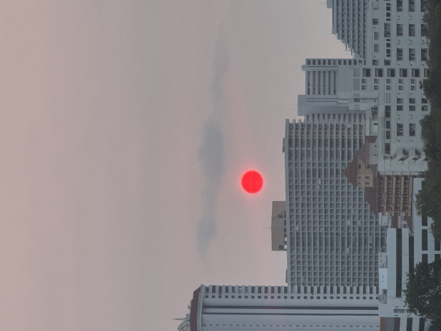 Striking red sun phenomenon observed over Pattaya City Thailand