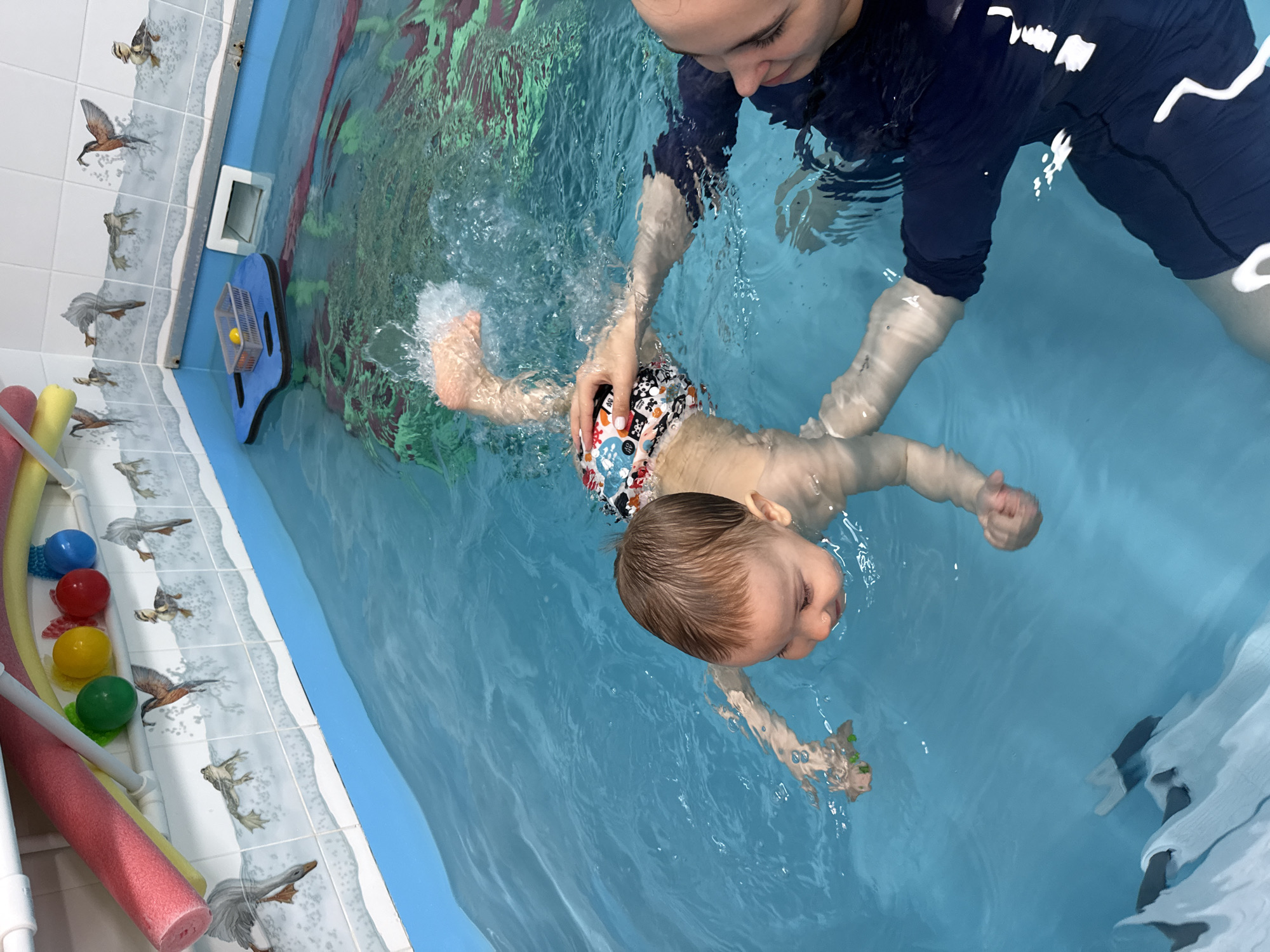 Swimming lesson observed at indoor pool in Rusanovo
