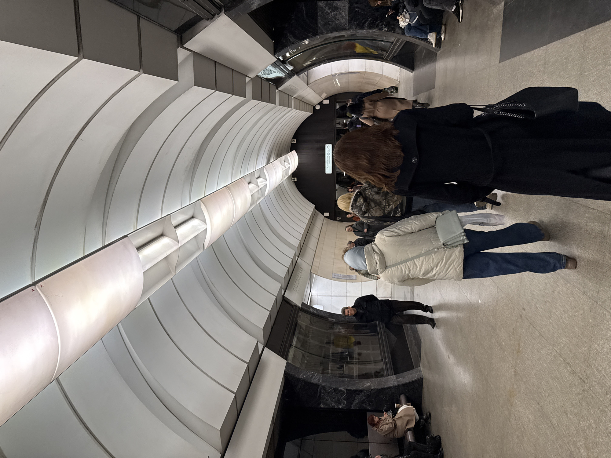 Morning commuters navigate Moscow's Mayakovskaya metro station