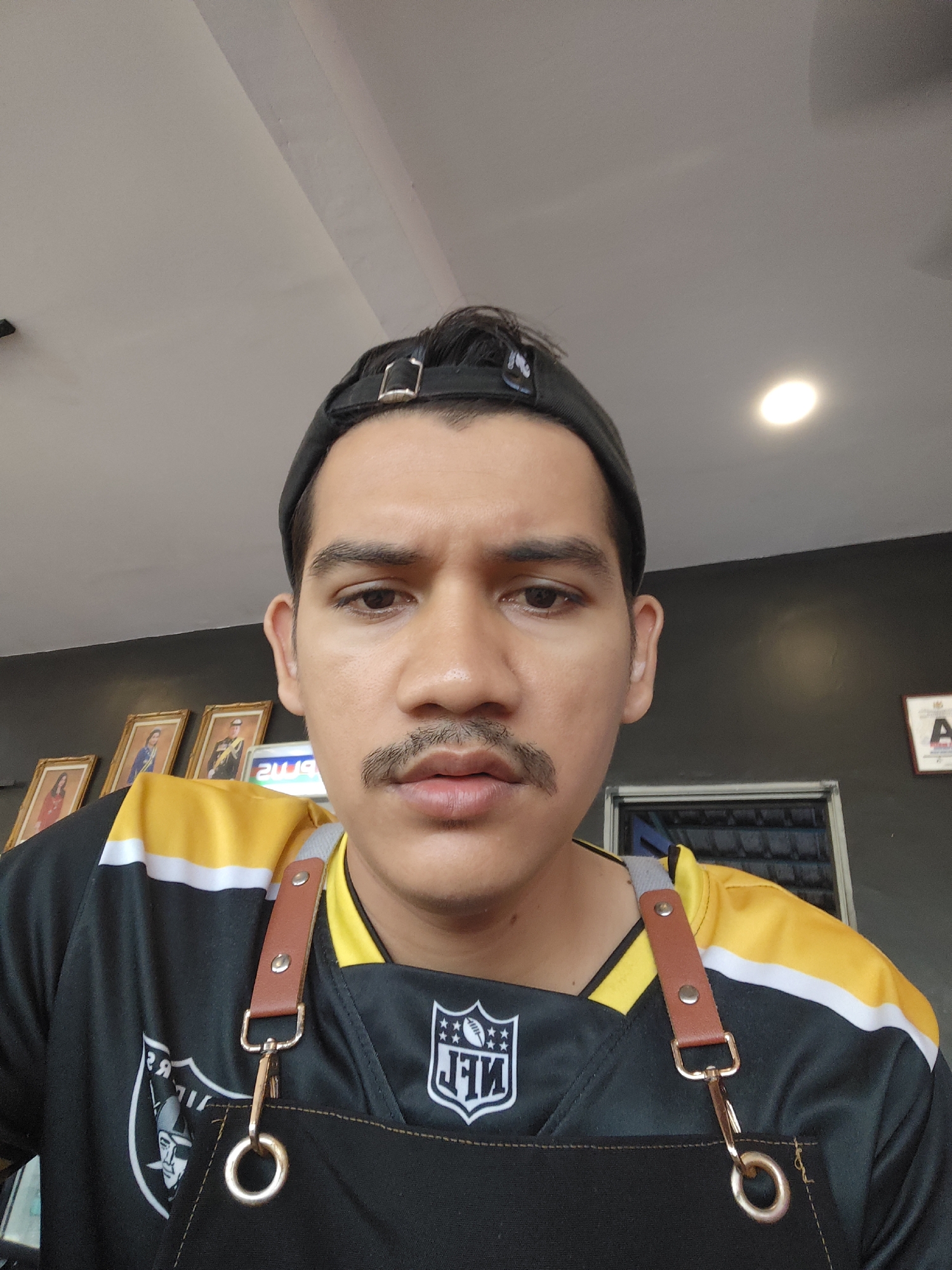 Casual selfie in Kota Tinggi, NFL jersey and apron on.