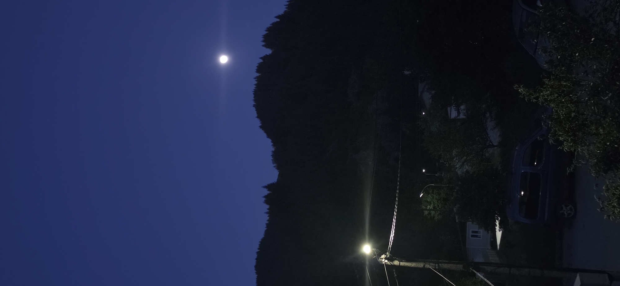 Full moon observed over Rudozem, Bulgaria residential area