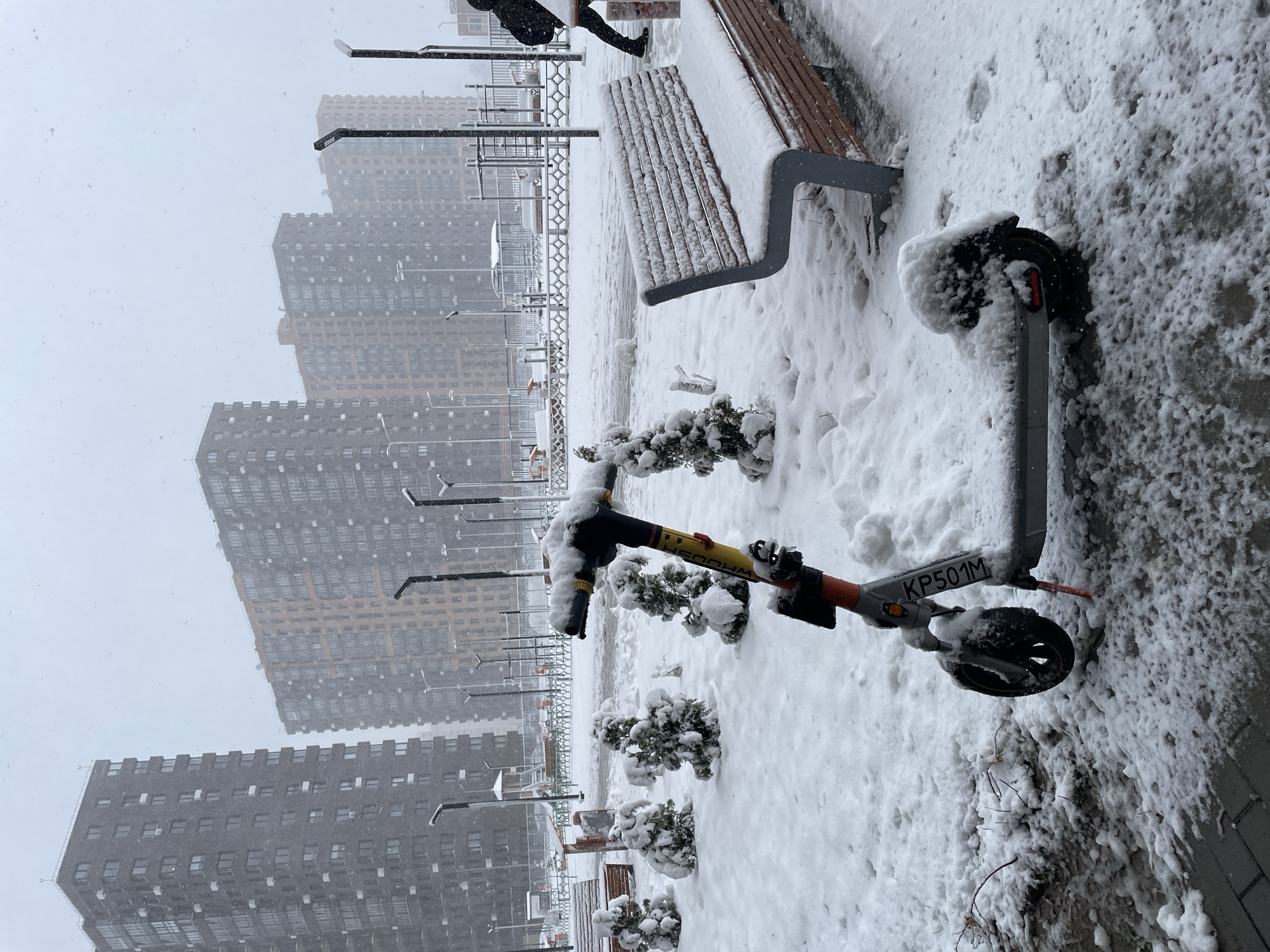 Heavy April snowfall blankets Balashikha, Russia streets and residents