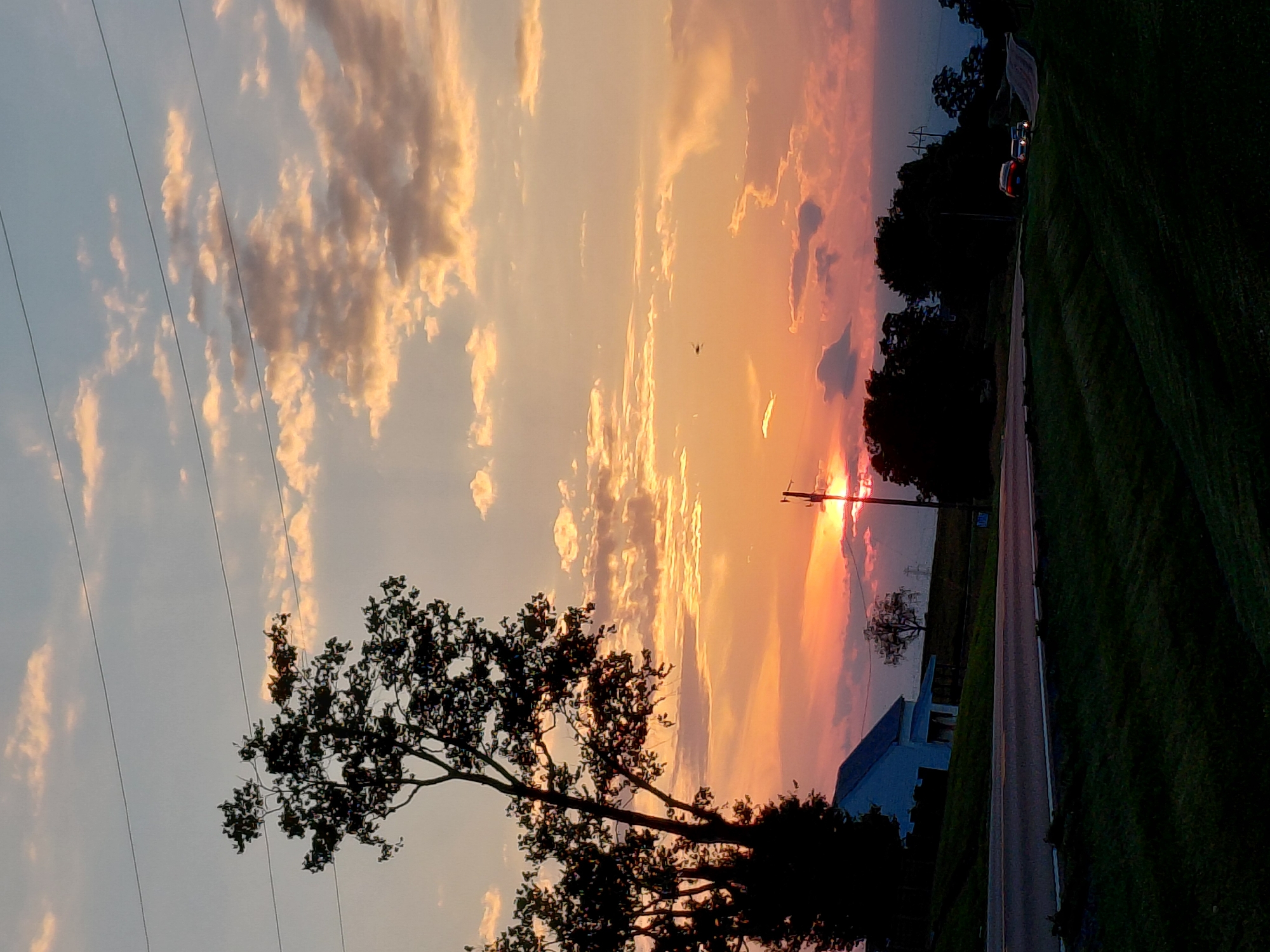Sunset over a quiet rural road near Lancaster, Kentucky