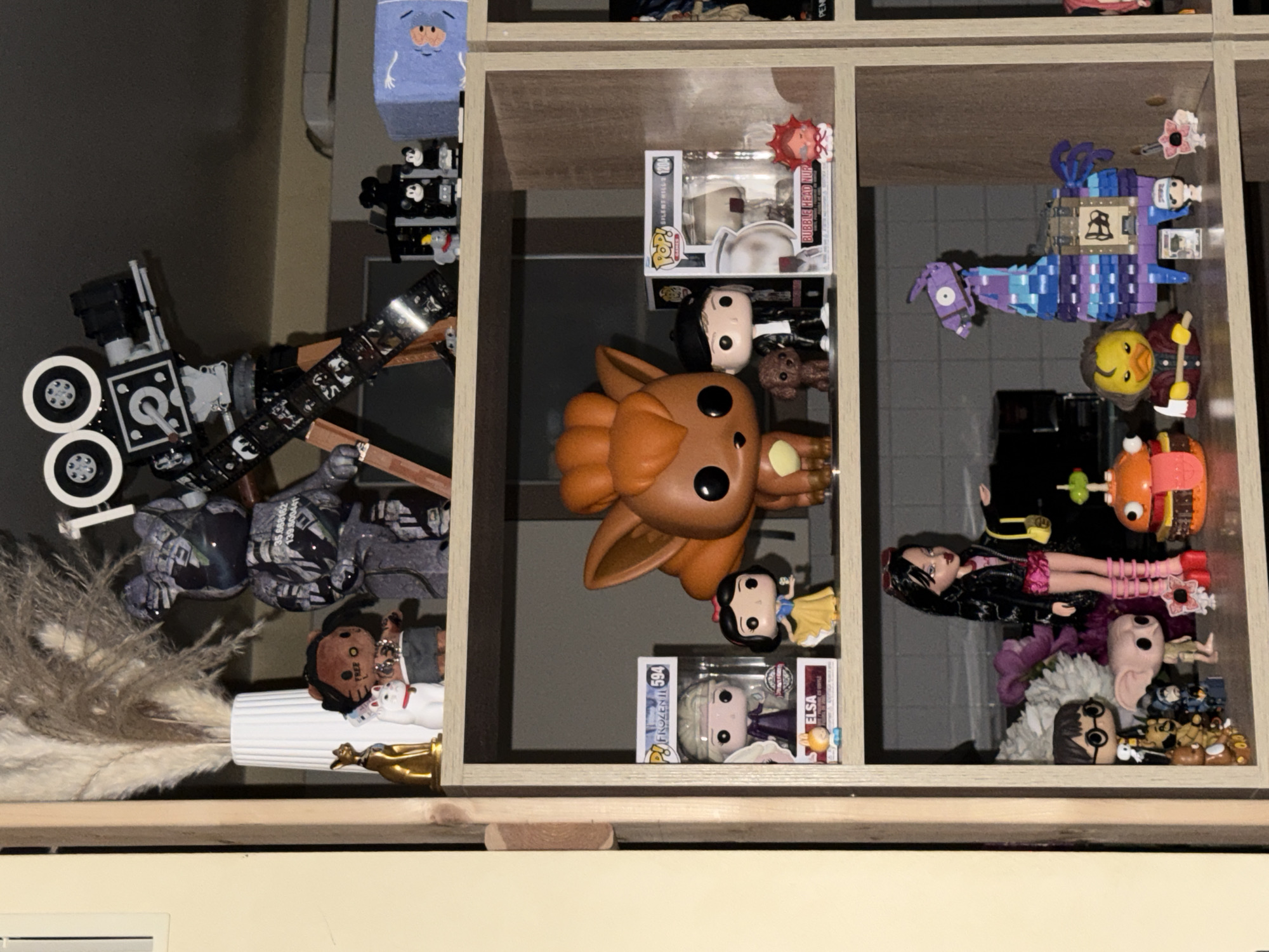 Funko Pop and Bratz collection on display in a Khimki home