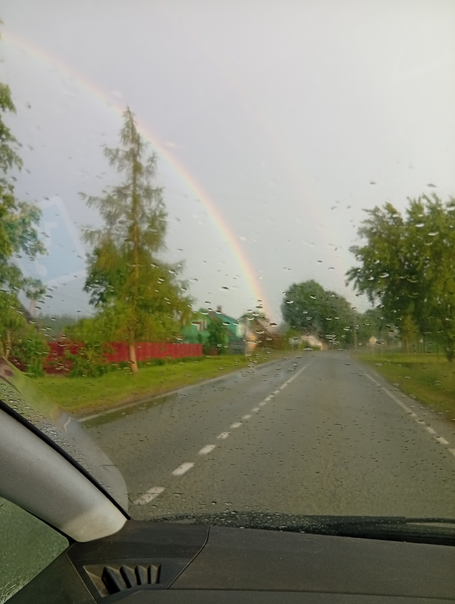 Double rainbow spotted over rural Lithuanian village after rainfall
