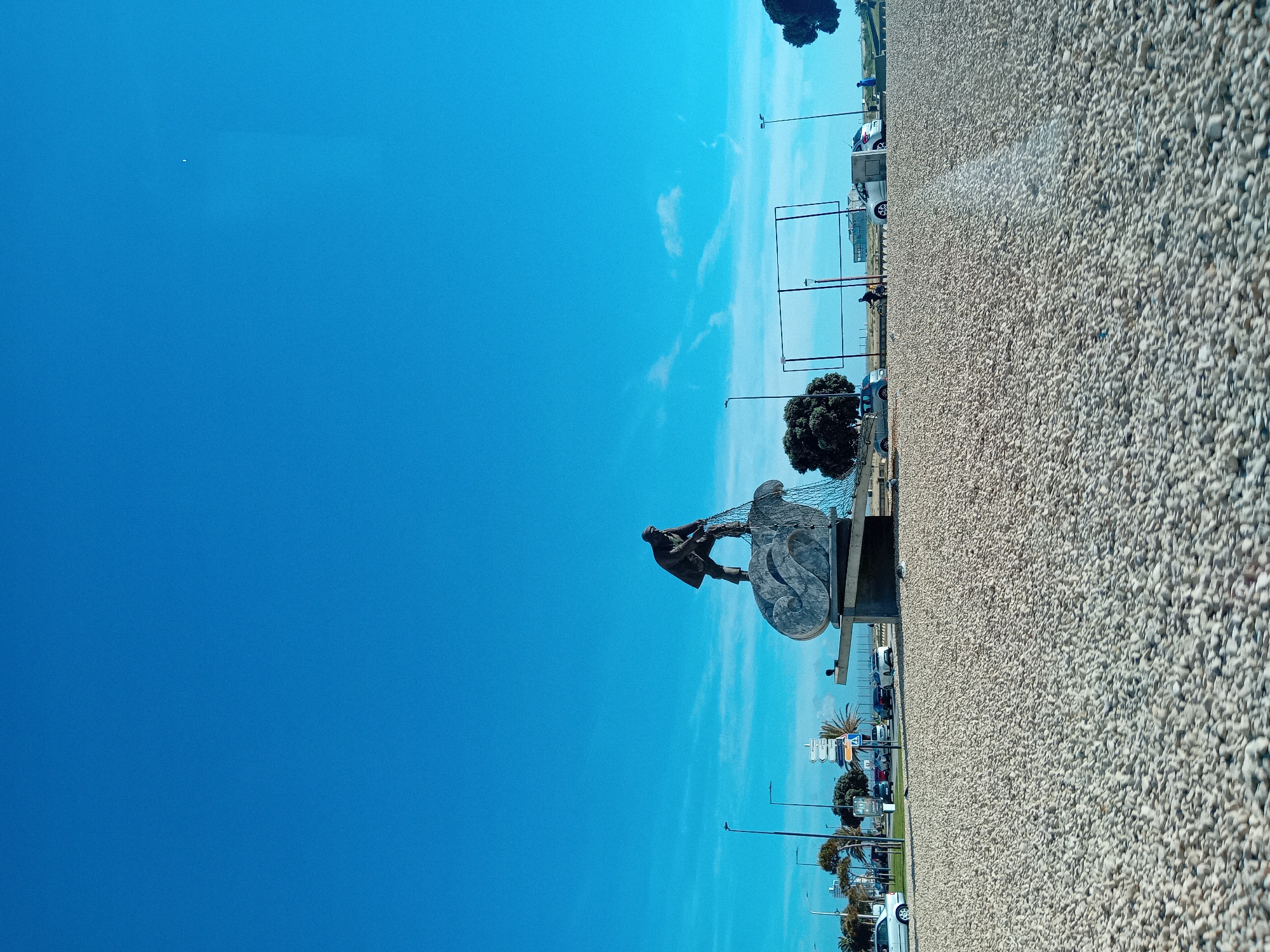 Sunny afternoon documented at Figueira da Foz monument and beachfront