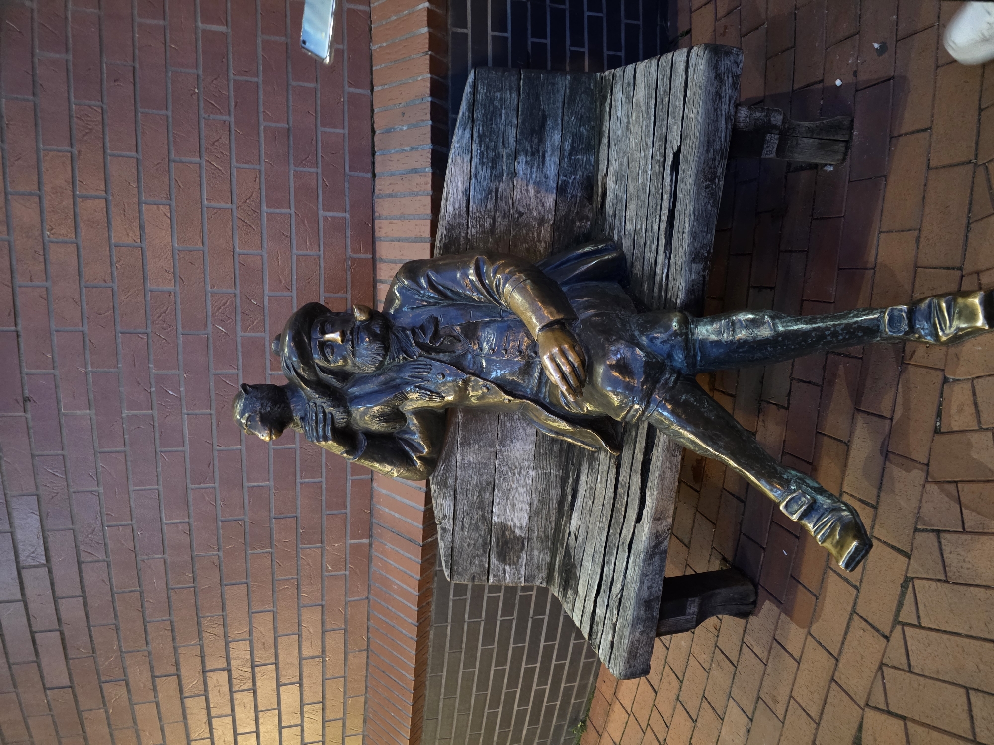 Bronze sculptures and waterway scenes across an August evening in Kaliningrad