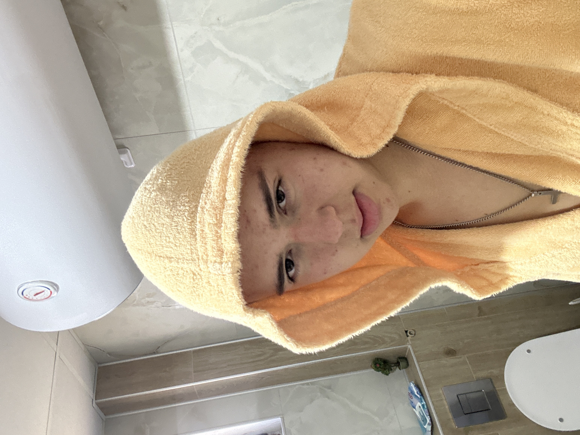 Young man films post-shower routine in Zlatograd bathroom