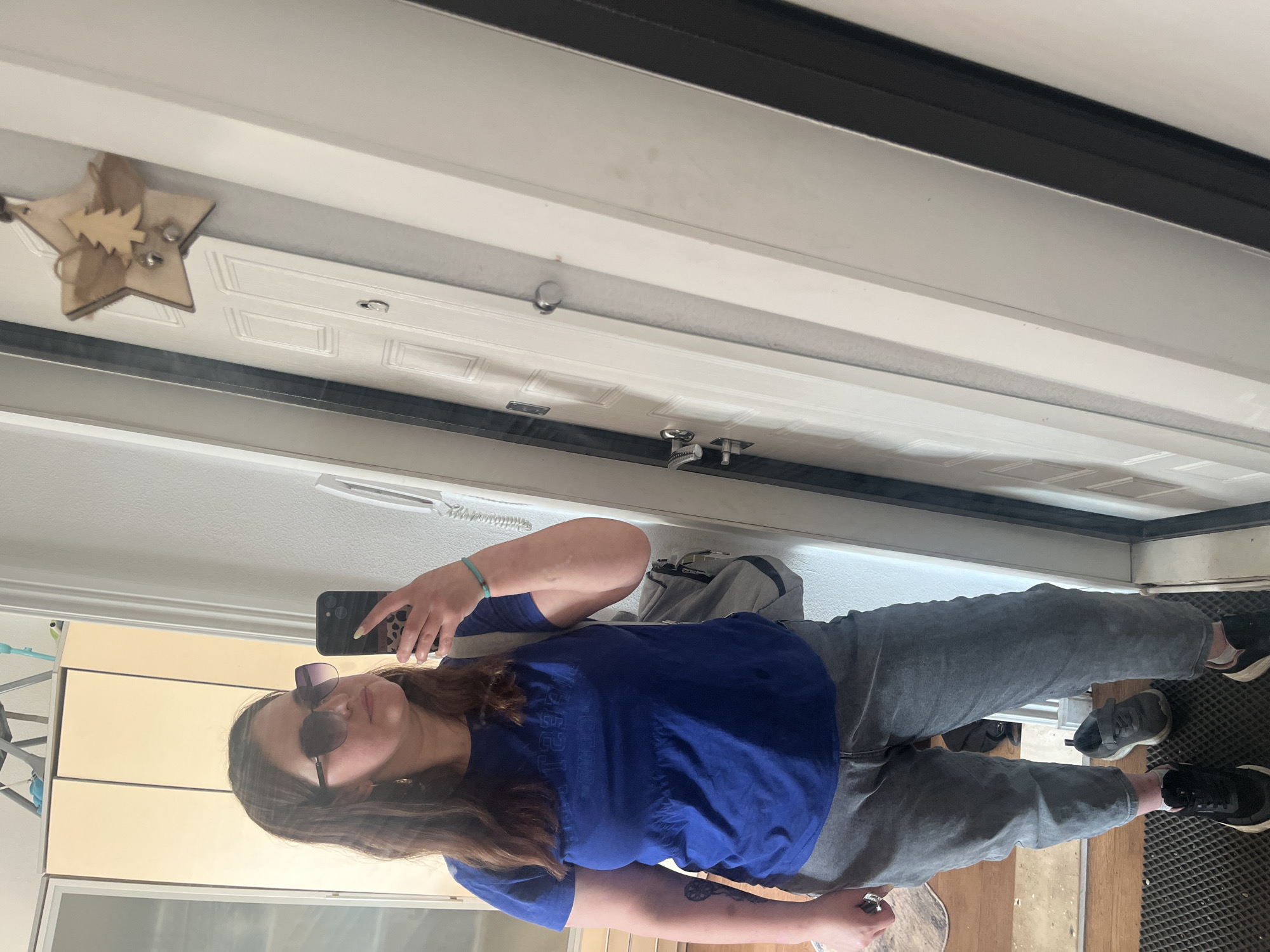 Mirror selfie series, blue tee and sunglasses, same outfit throughout