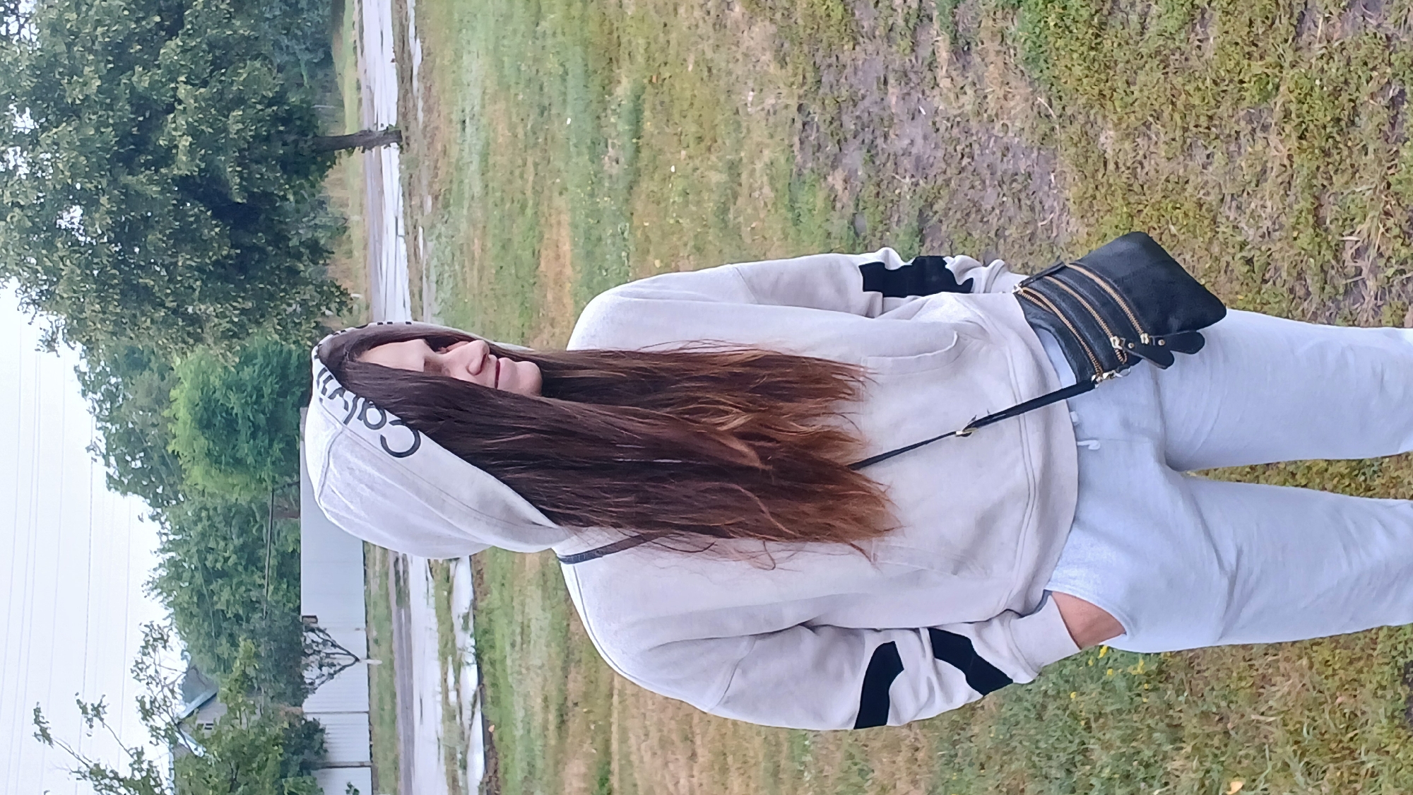 Casual outdoor moment in a striped Calvin hoodie