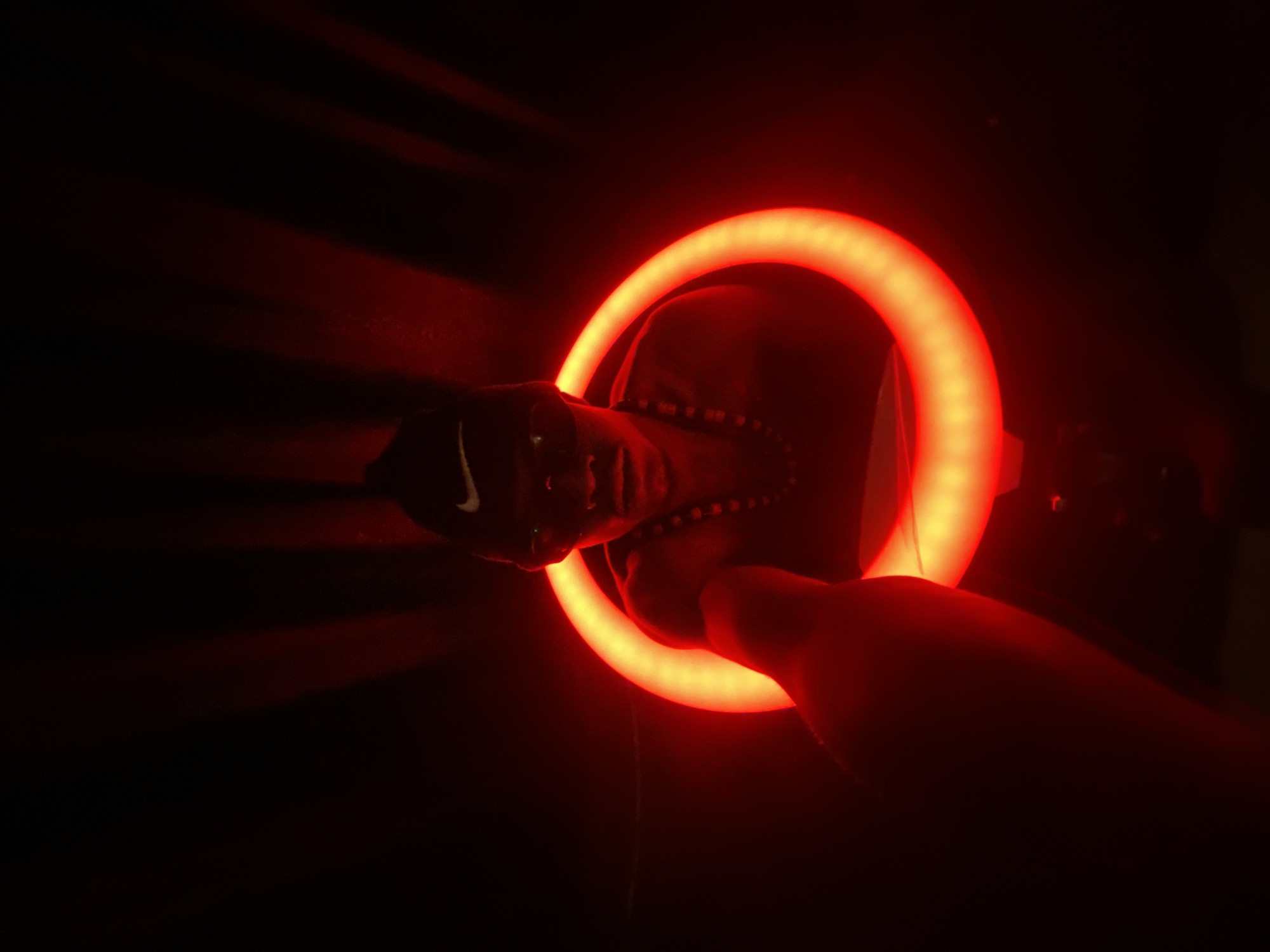 Red ring light portrait session in Abakaliki, Nigeria.