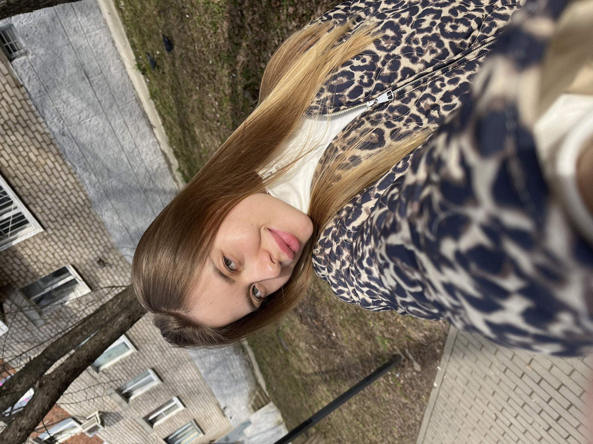 Woman in leopard jacket photographed around Chaikovsky, Russia