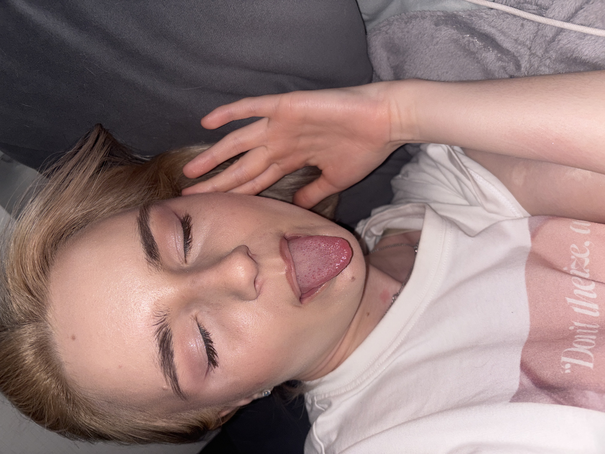 Young person photographed resting indoors in Russian city