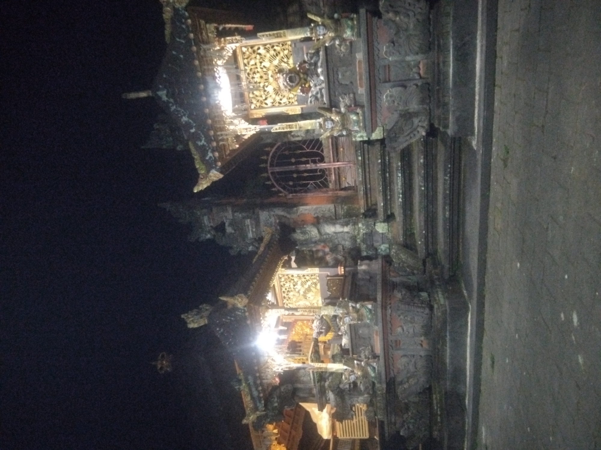Nighttime documentation of illuminated Balinese Hindu temple architecture
