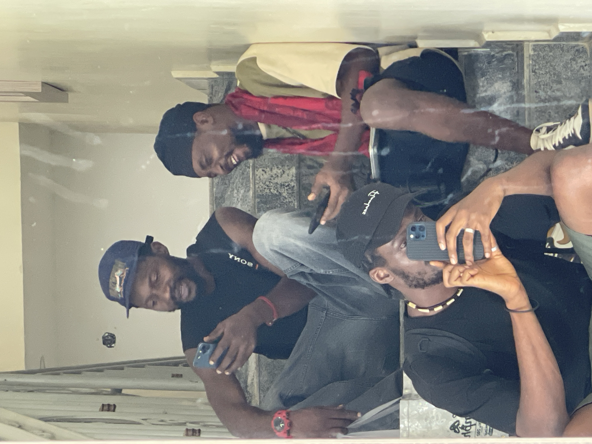Young men gather for casual hangout in Gwarinpa building