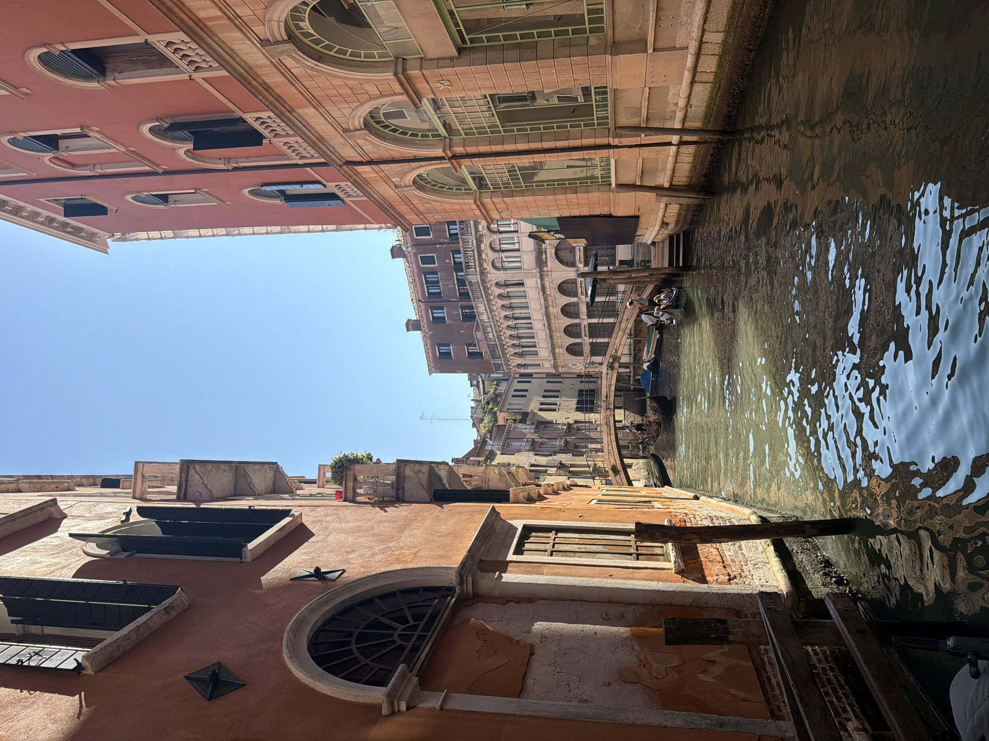 Selfies and canal light on a July afternoon in Venice