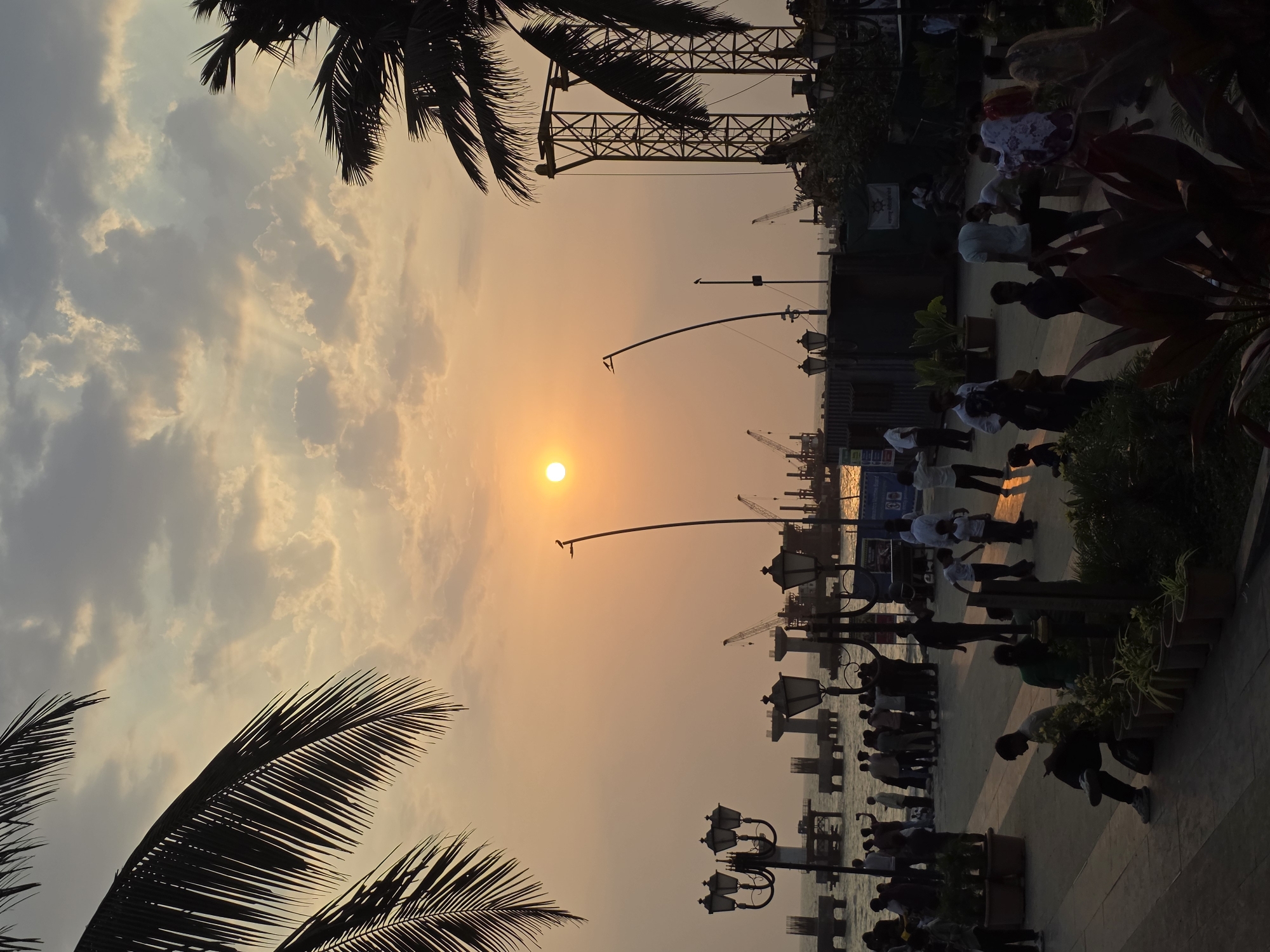 Mumbai sunset scenes captured including infrastructure and street life