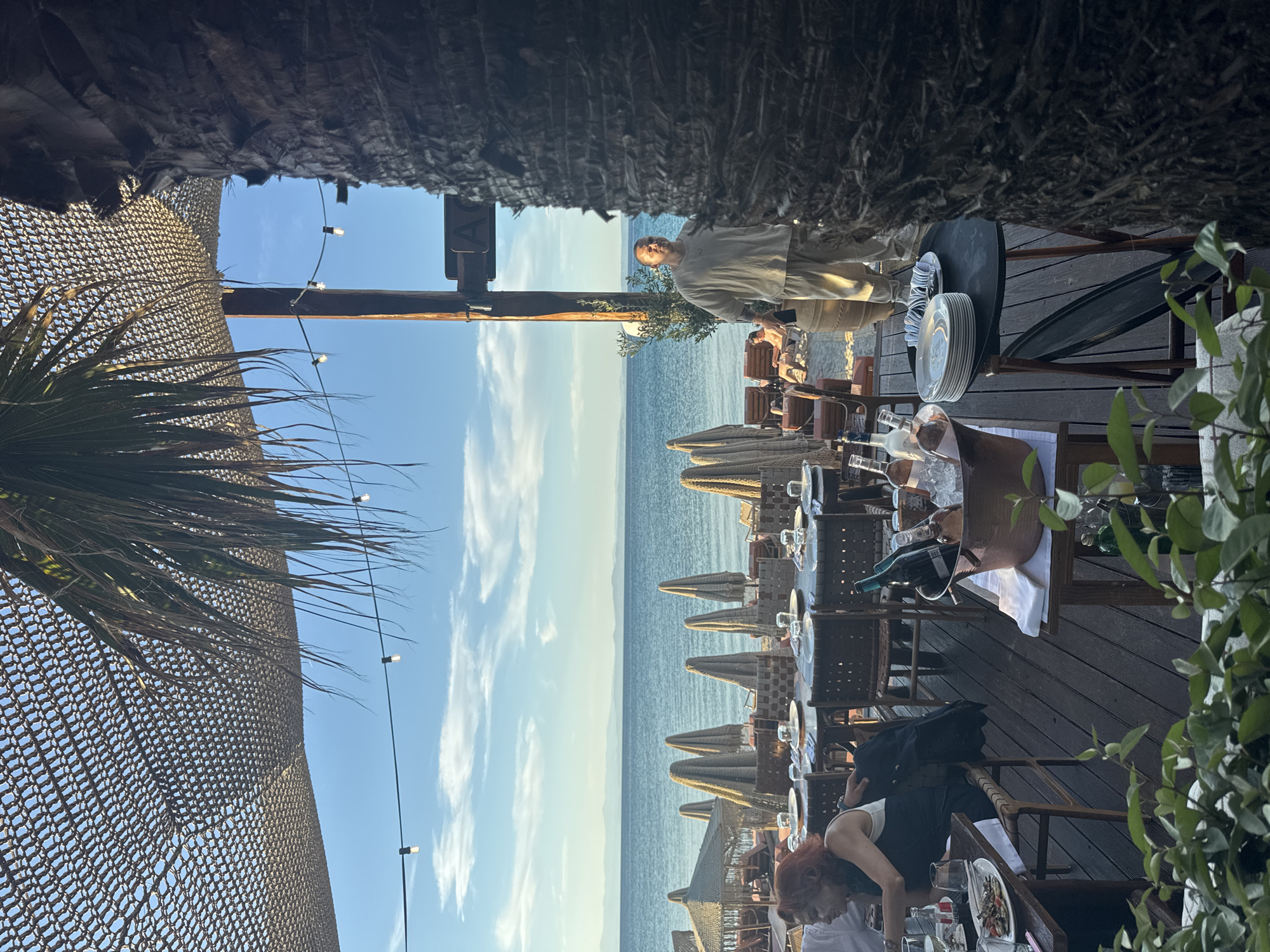 Birthday party celebrated at seaside restaurant in Greece