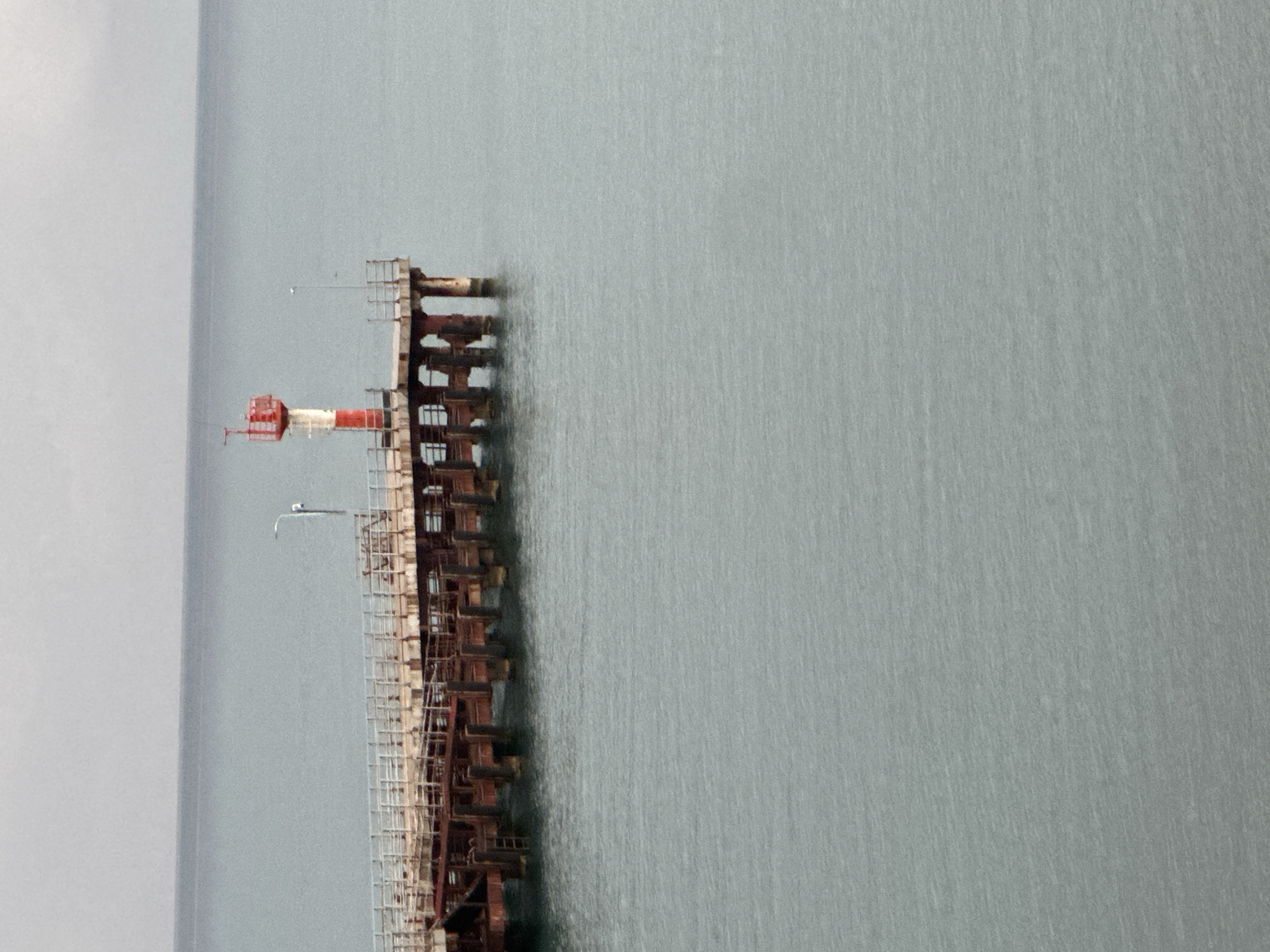 Sochi pier and coastline on a grey summer morning