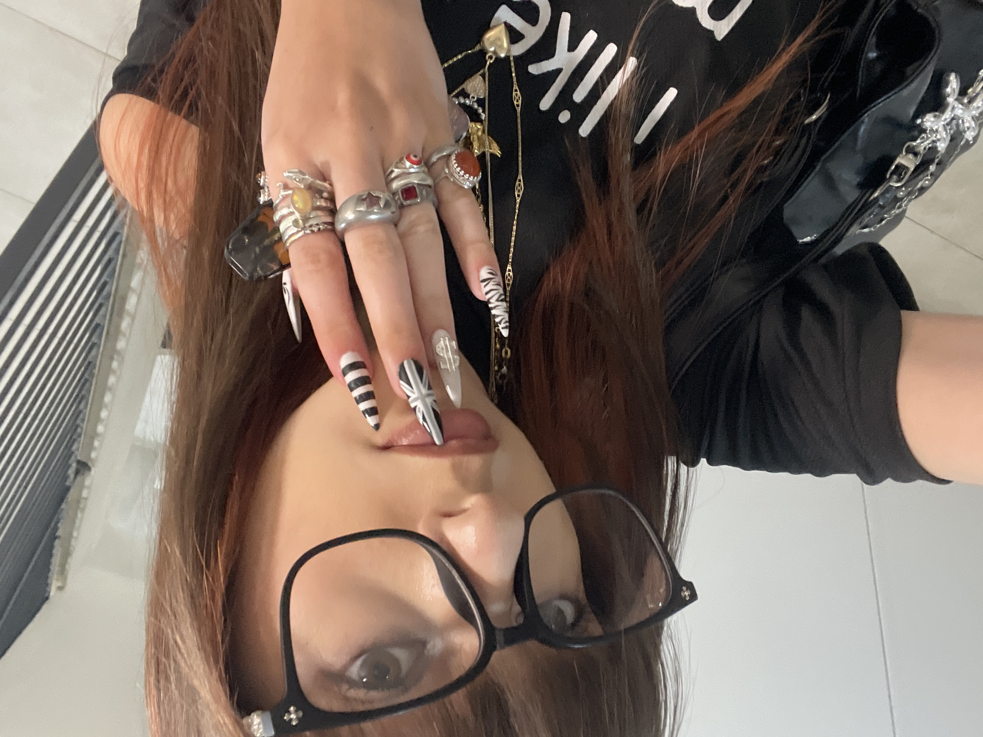 Woman takes multiple elevator selfies in Raanana, Israel