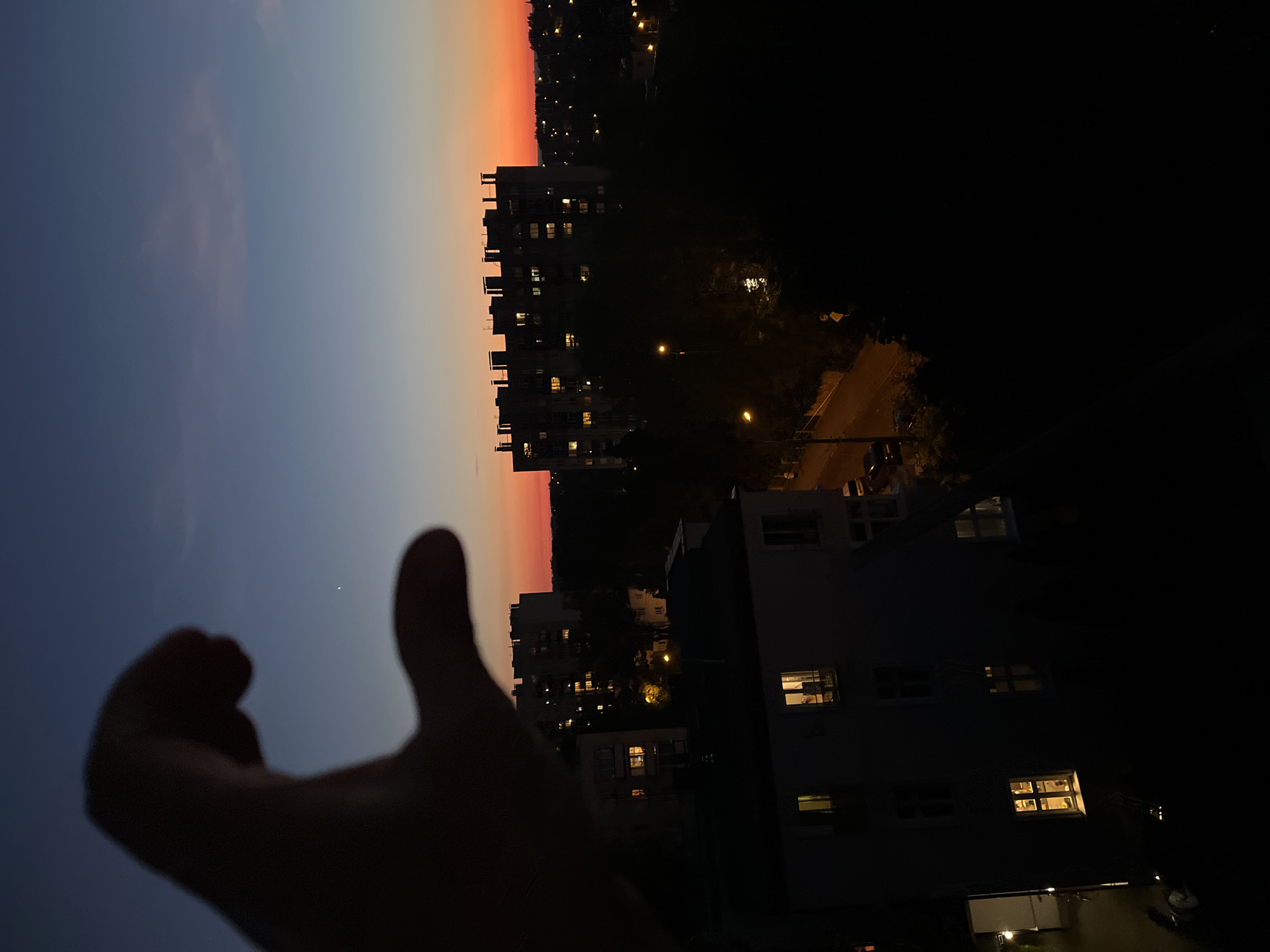 Sunset watched slowly from the city, one evening in June