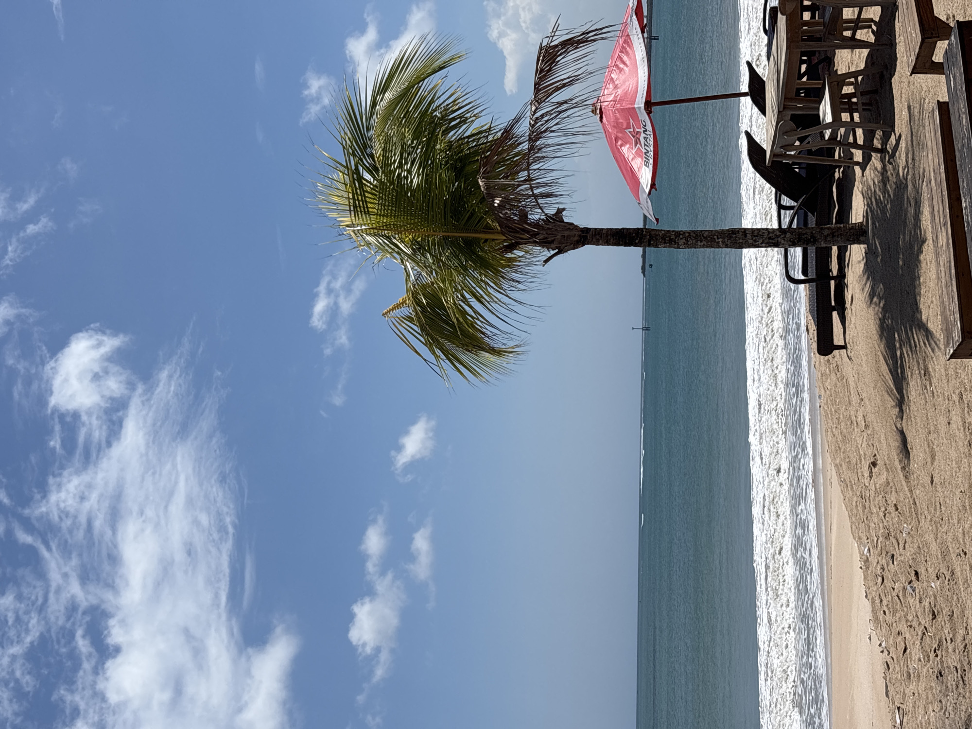 Kuta Indonesia scenes show beach tourism alongside waste management operations