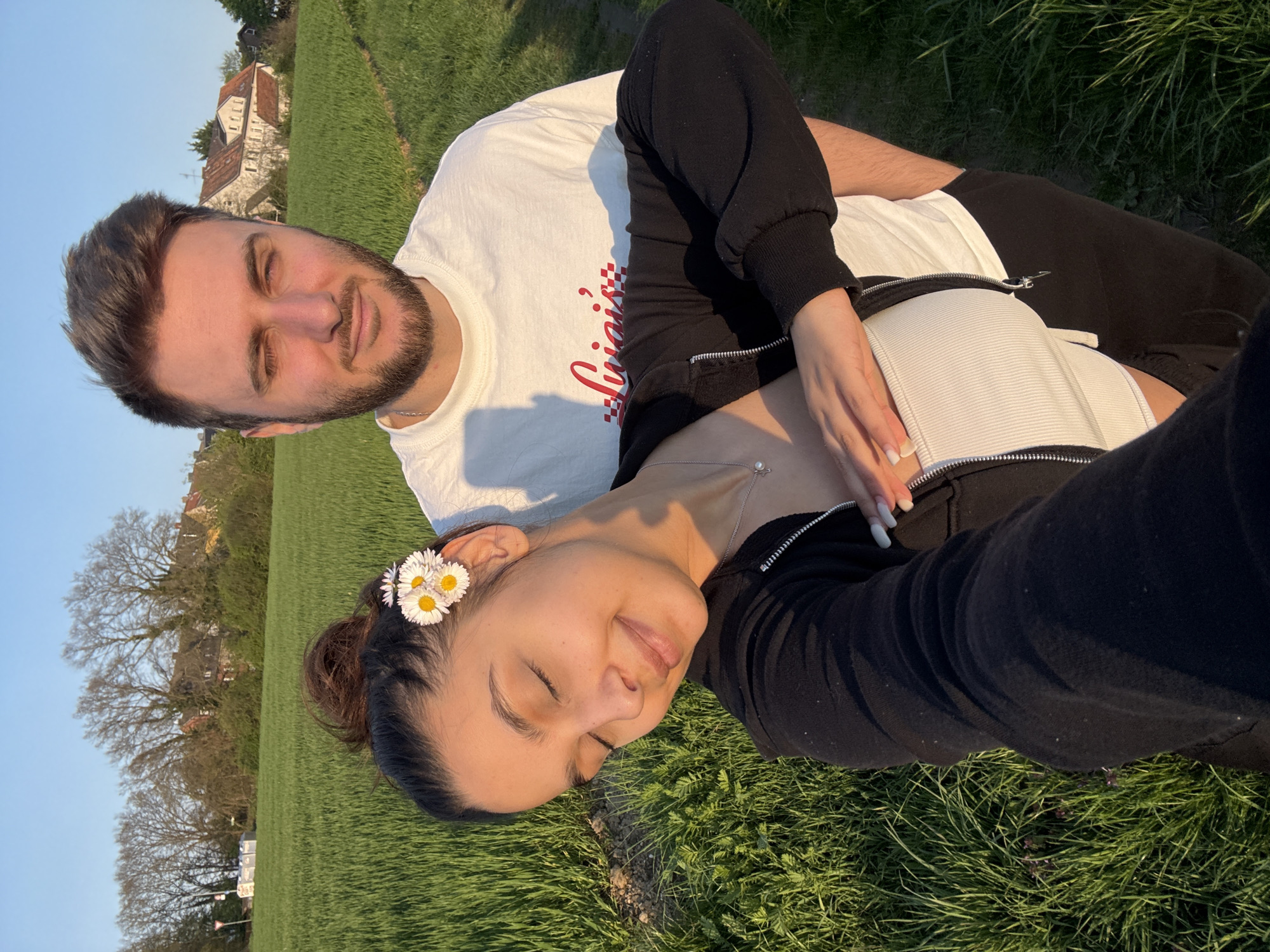 Couple spotted relaxing together on grass field in Mönchengladbach