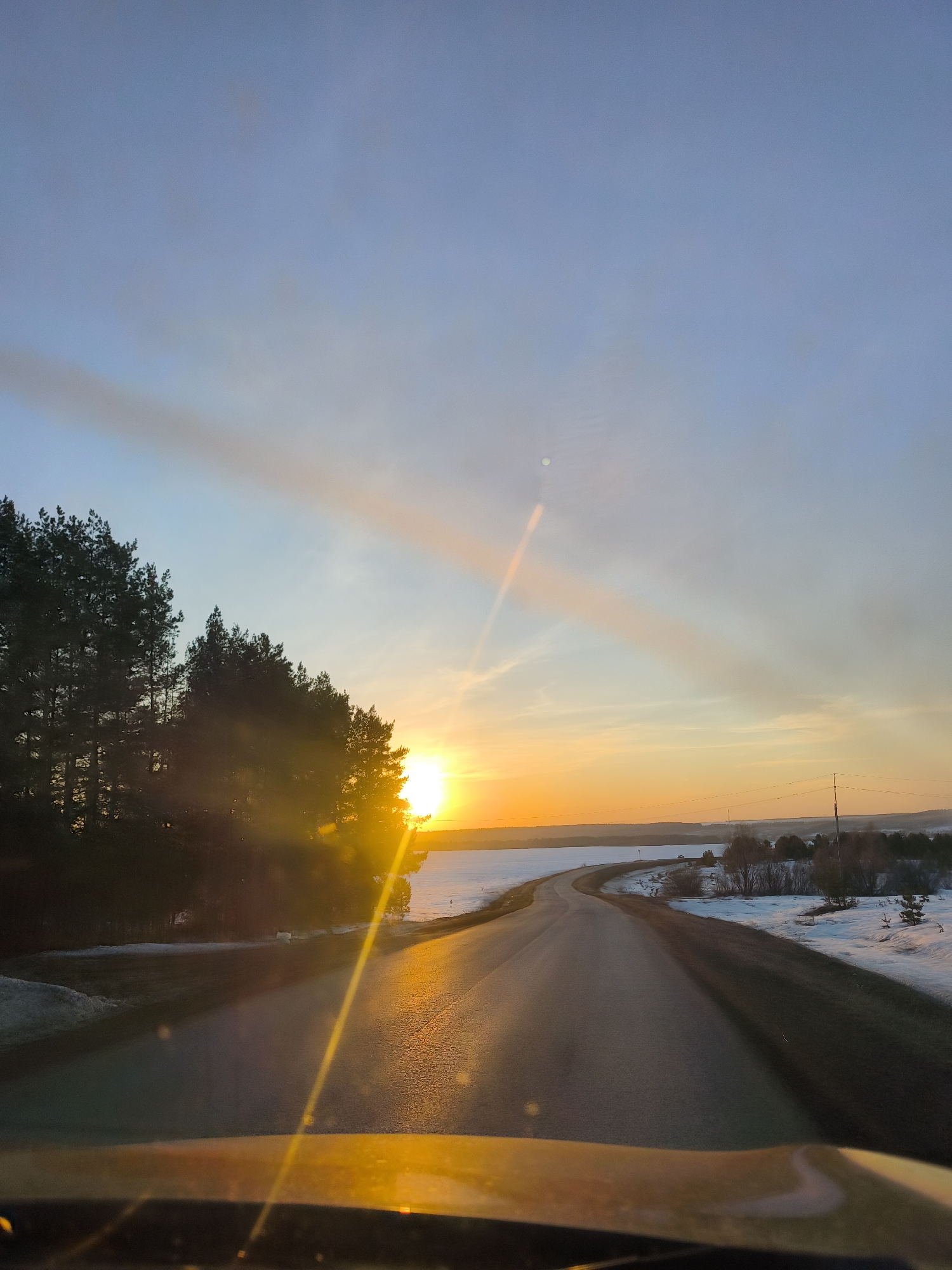 Driver captures sunset road journey near Lubyanki, Russia