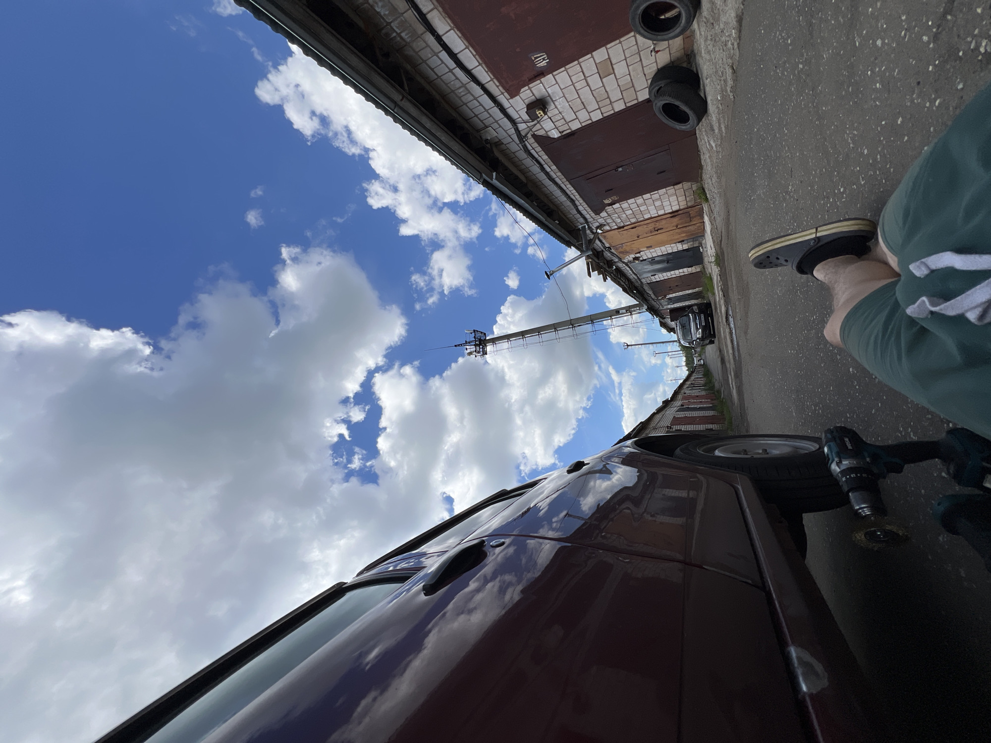 Car repair day at a Veteran-2 garage, summer morning